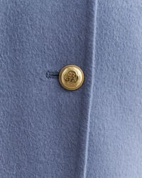 Jekker met handgestikt detail