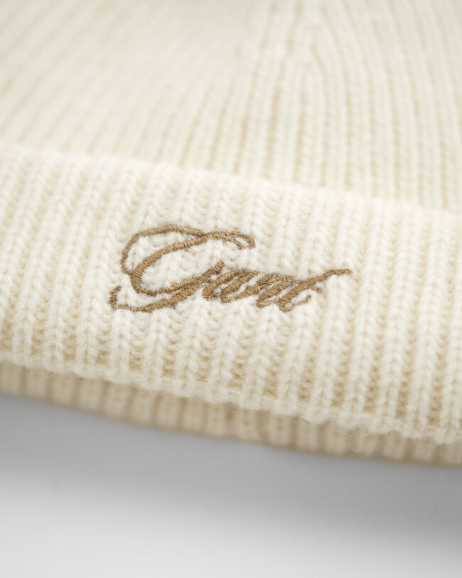 Bonnet avec rabats d'oreilles et pompon Bébé