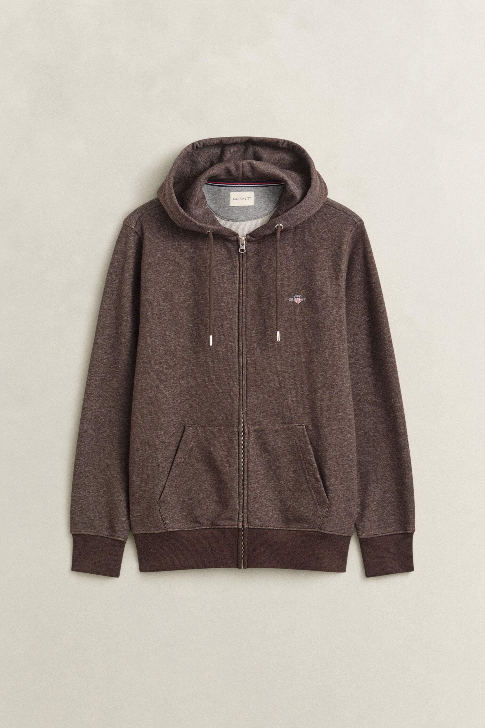 Sweat à capuche zippé avec écusson