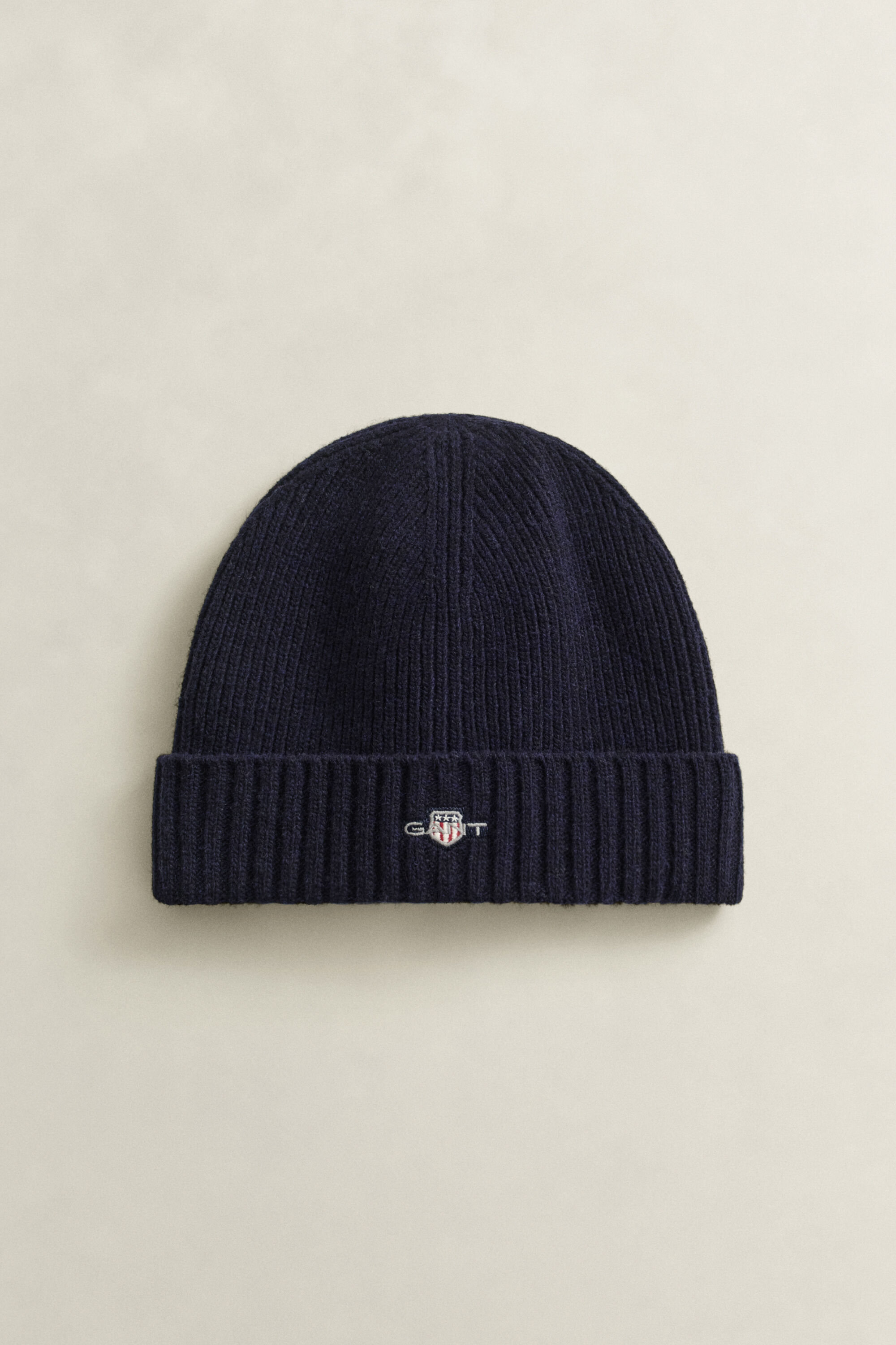 Bonnet en laine avec écusson