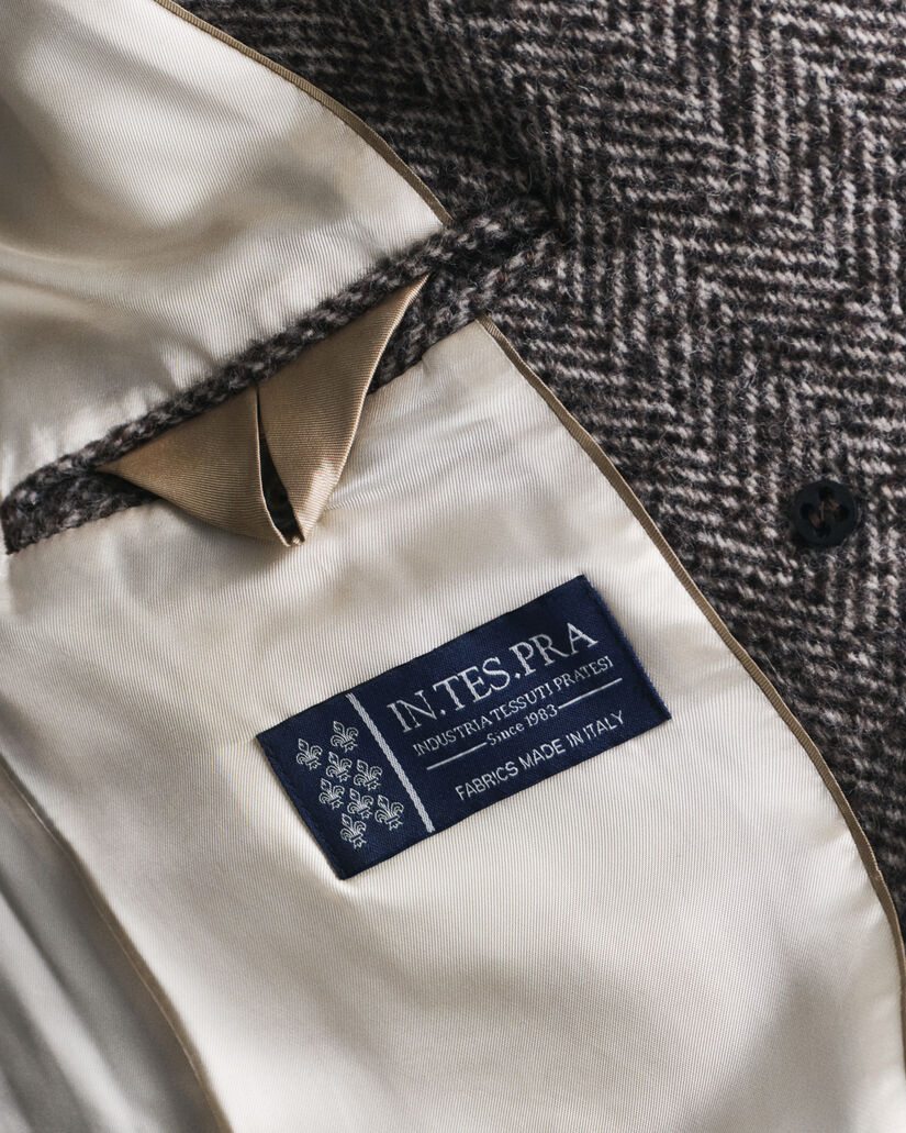 Overjas van wolmix met visgraatmotief