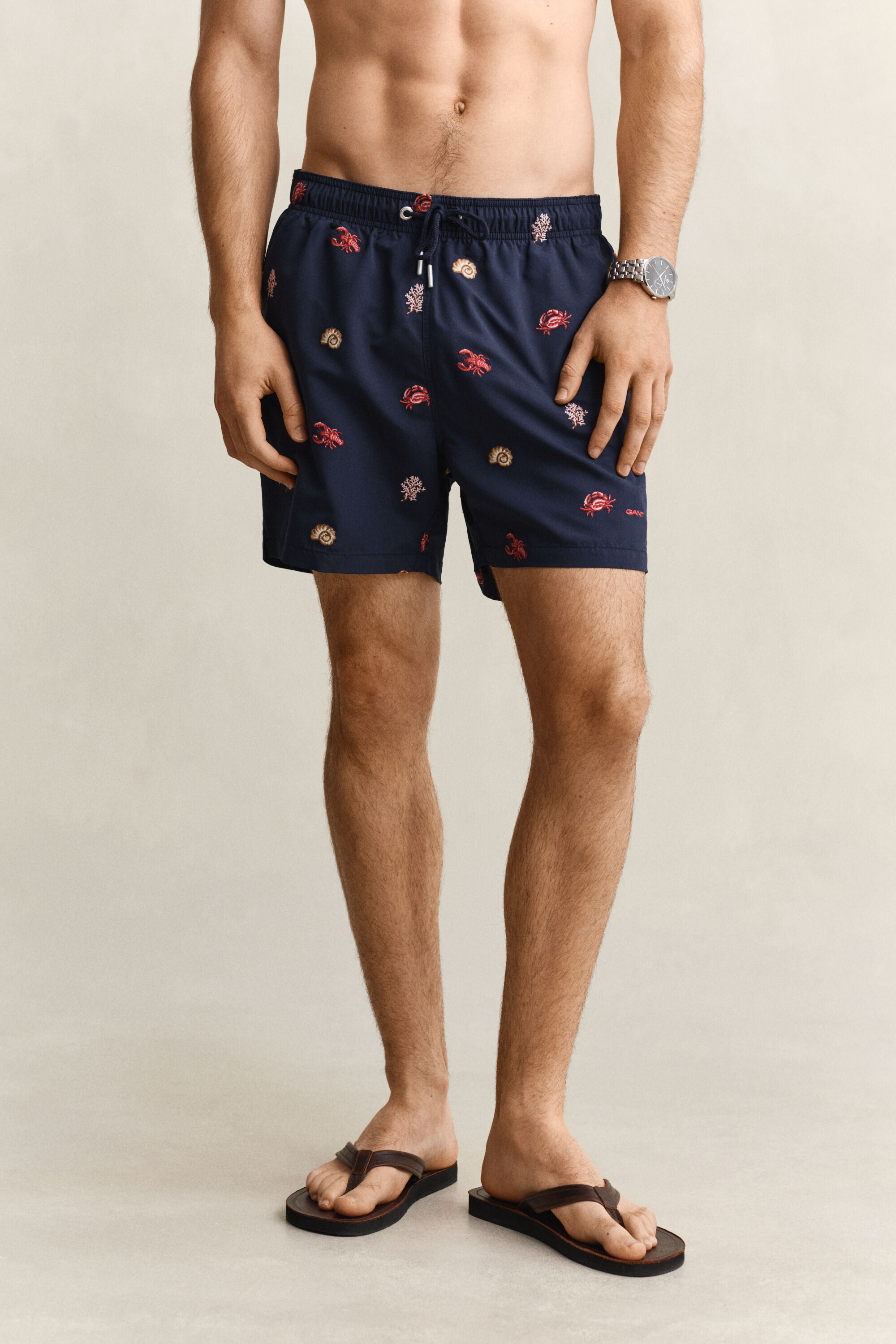 Short de bain à motif homard brodé