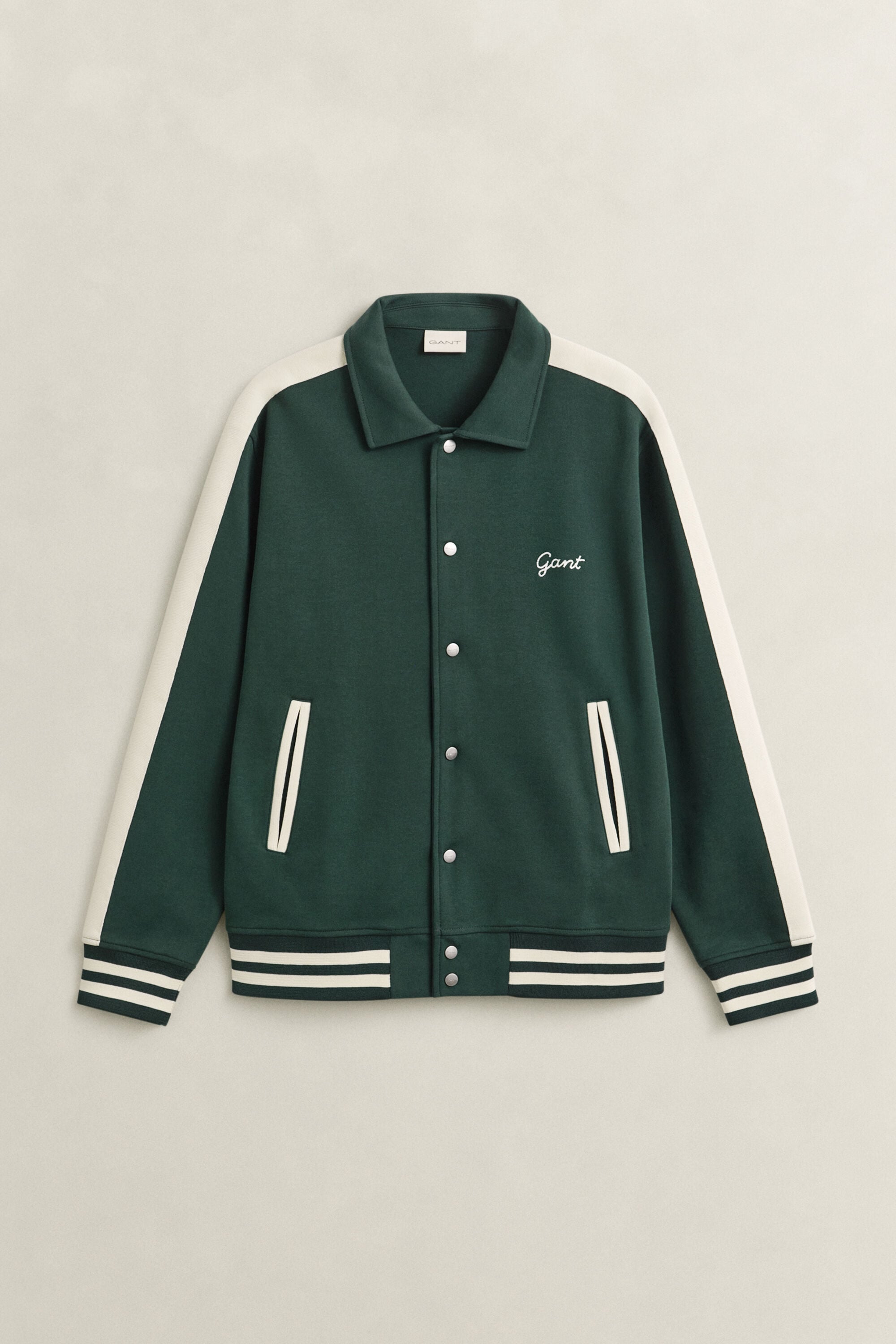 Veste boutonnée en maille interlock.
