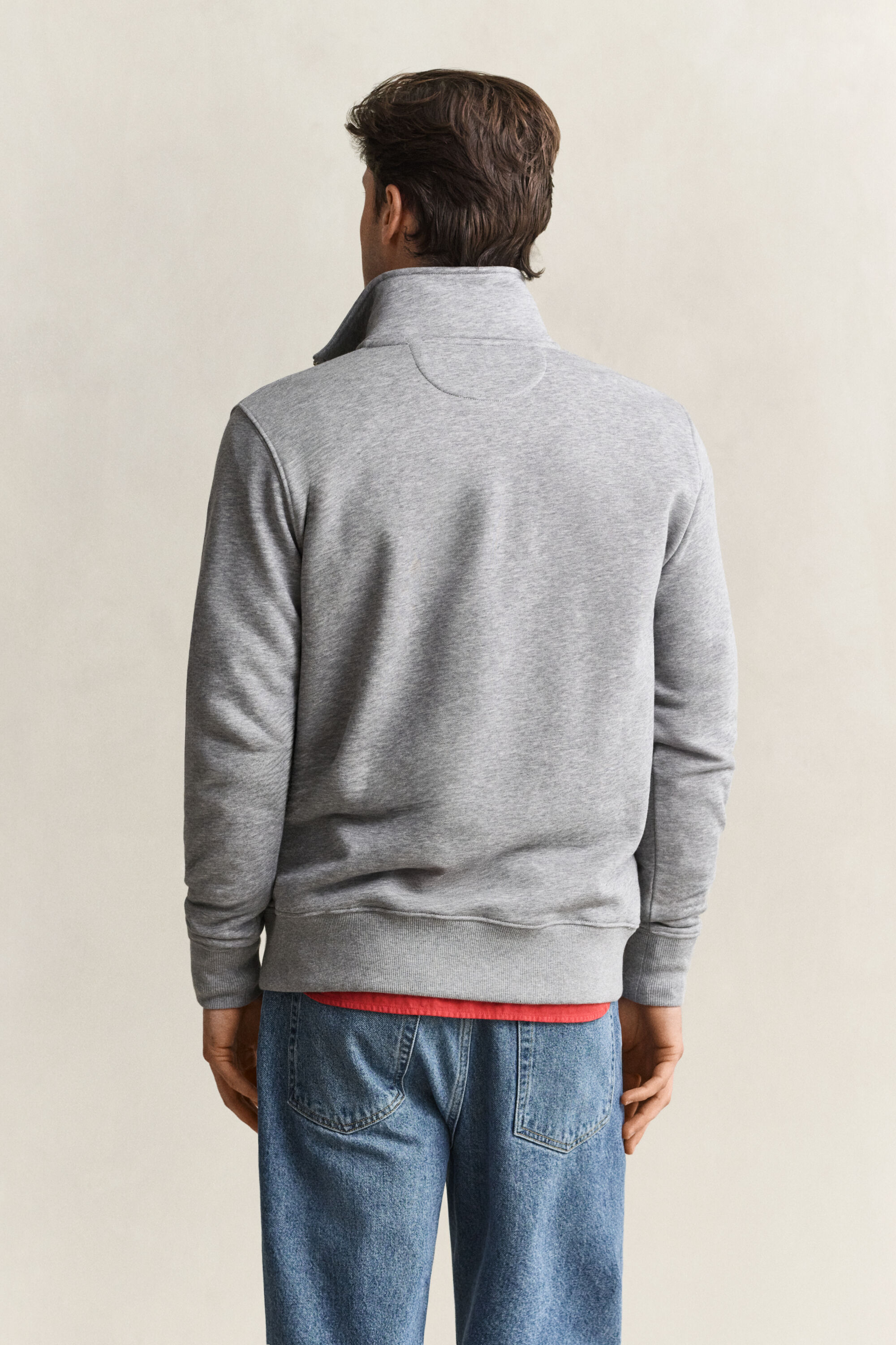 Sweat-shirt à demi-zip avec écusson