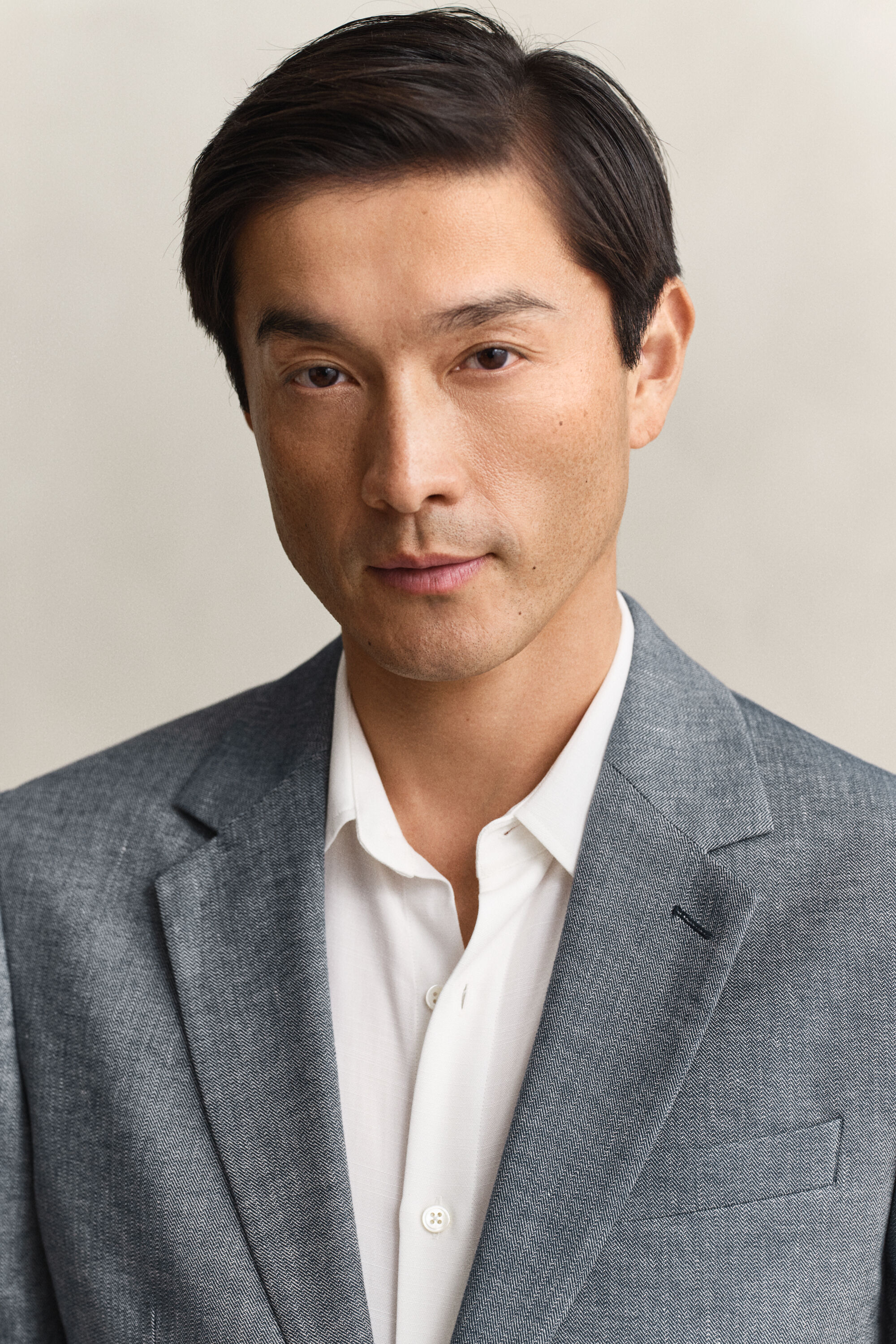 Indigo kostuumjasje met visgraatmotief