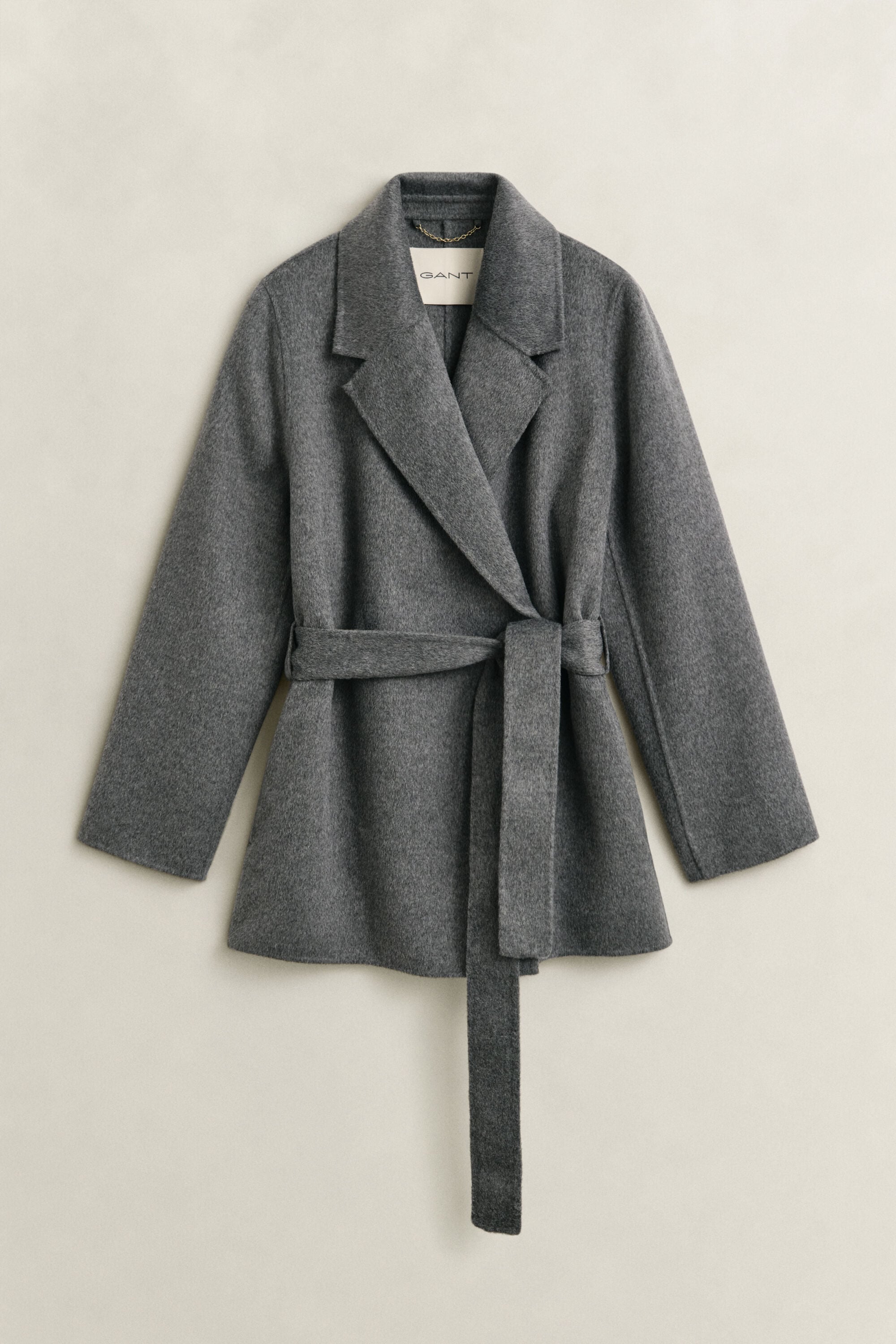 Veste cousue main avec ceinture