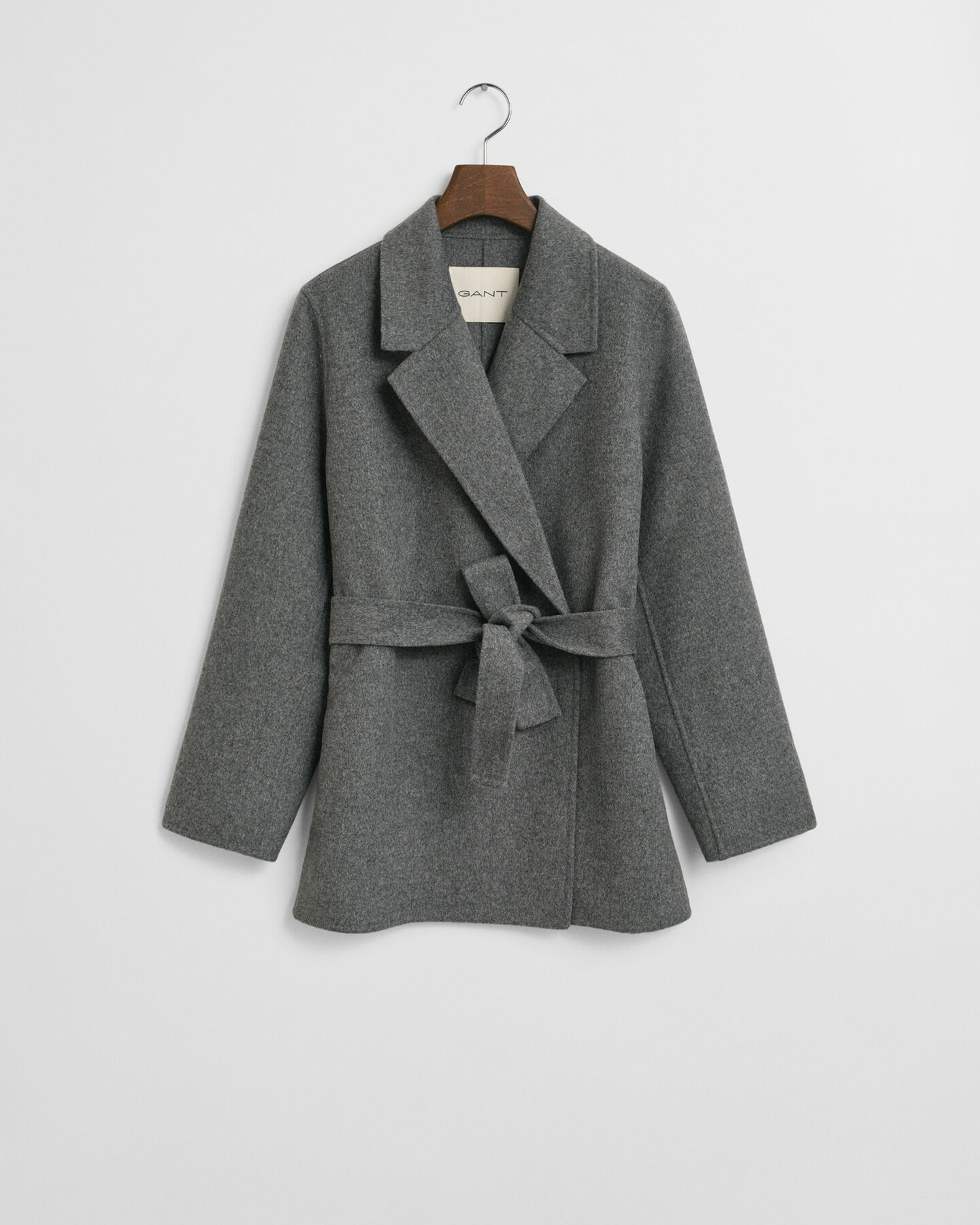 Met de hand gestikte jasje met ceintuur