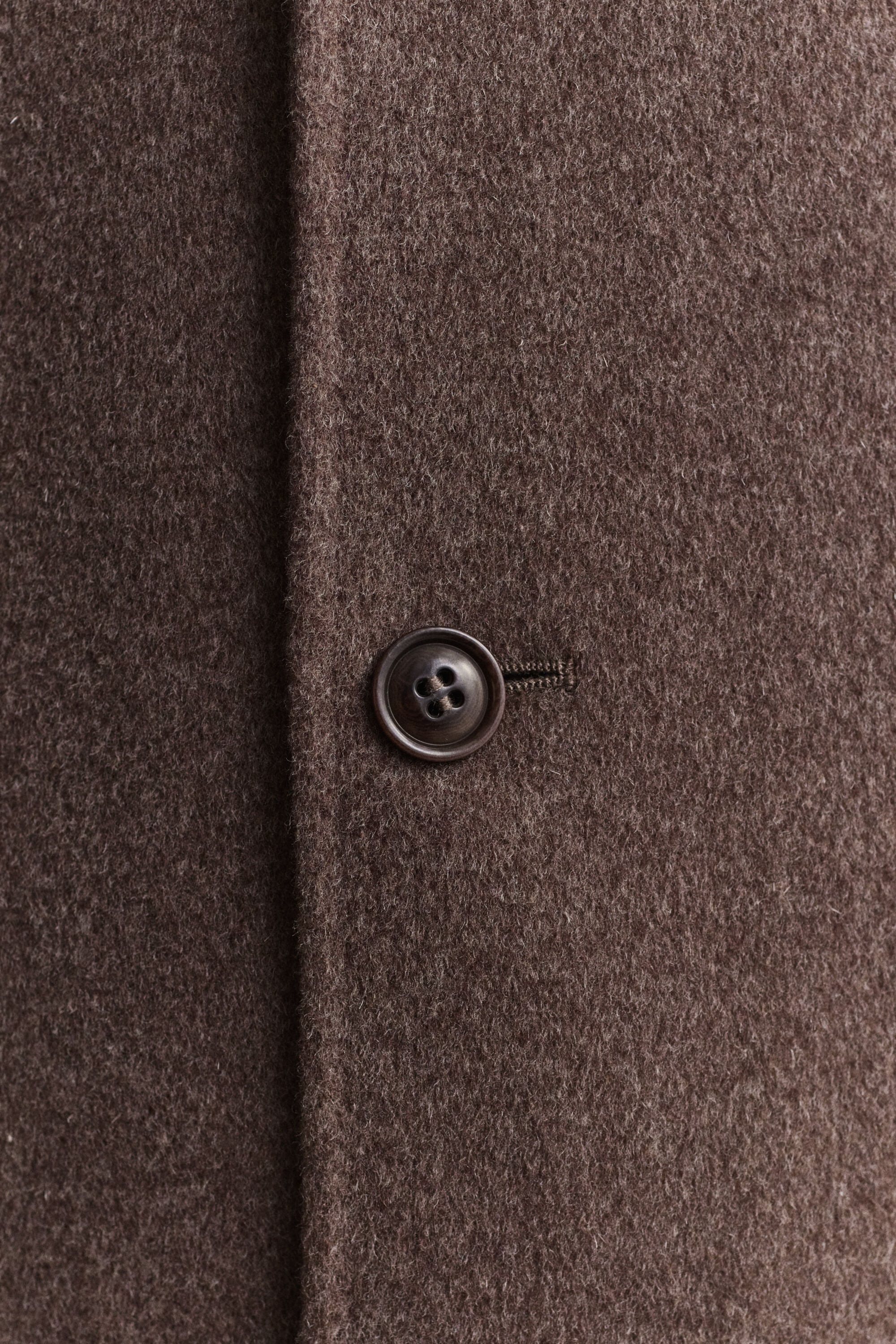 Manteau cousu main