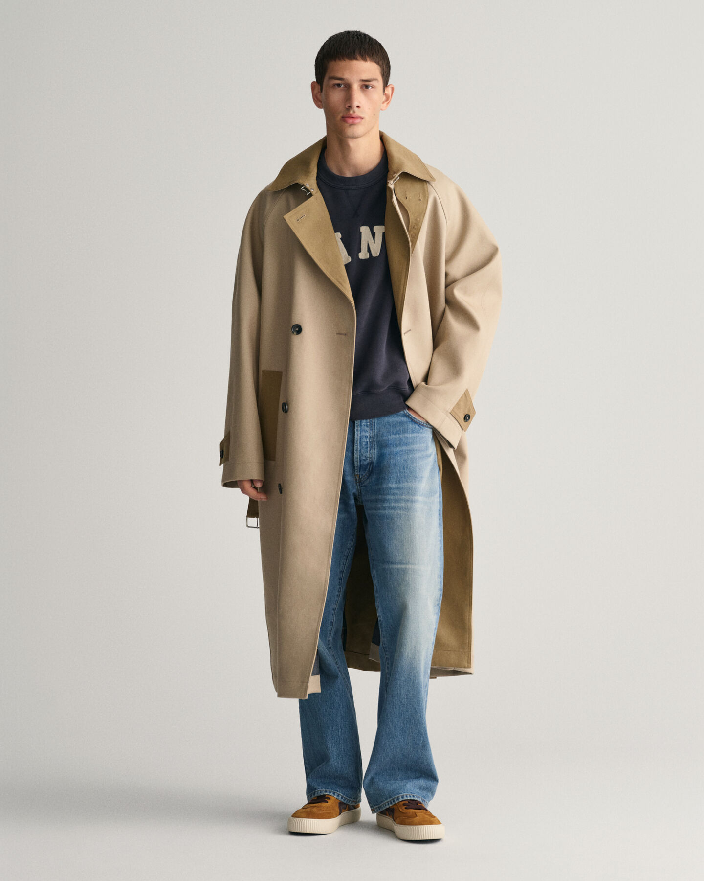 Trench-coat à coutures fixées