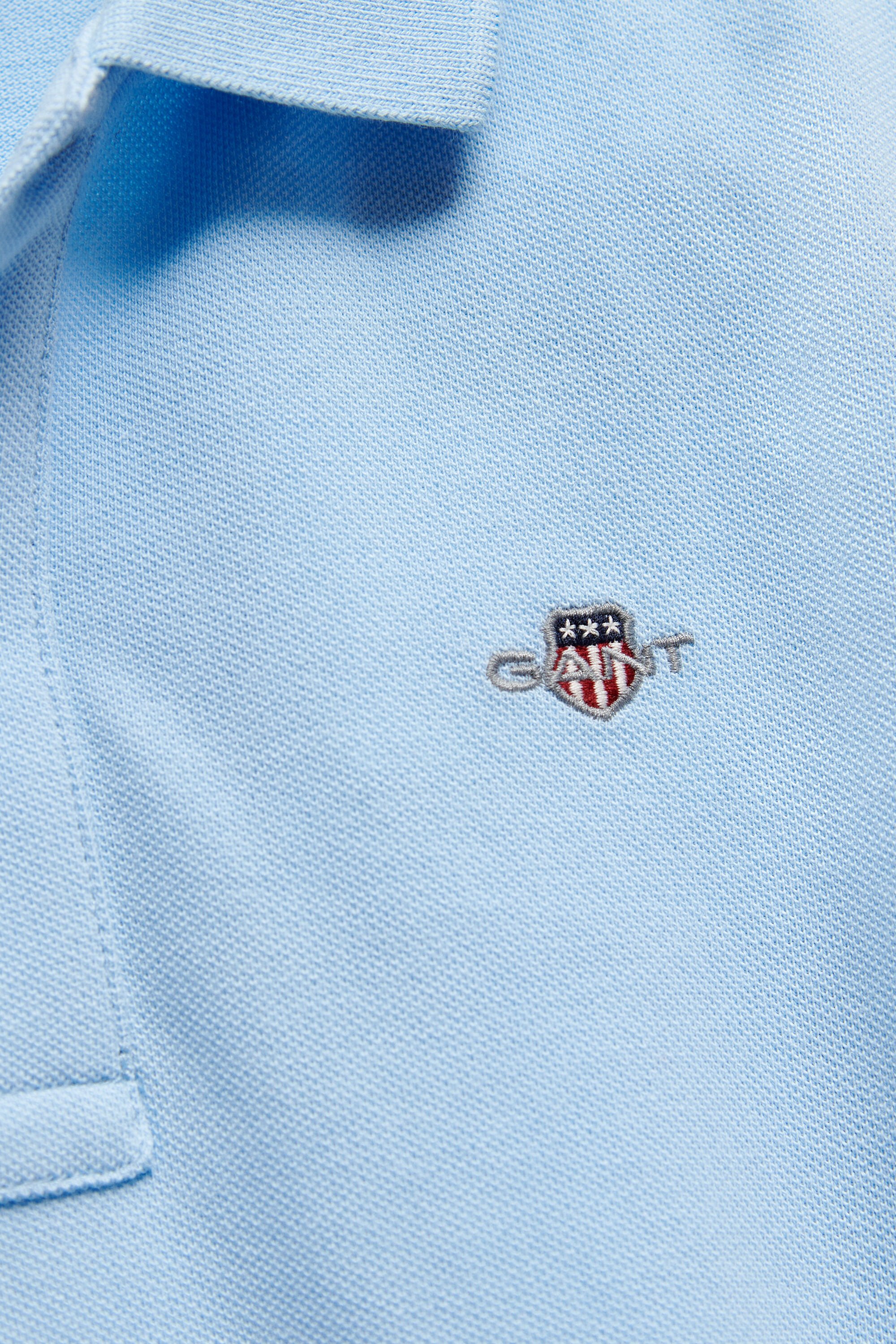 Teens Shield piqué poloshirt