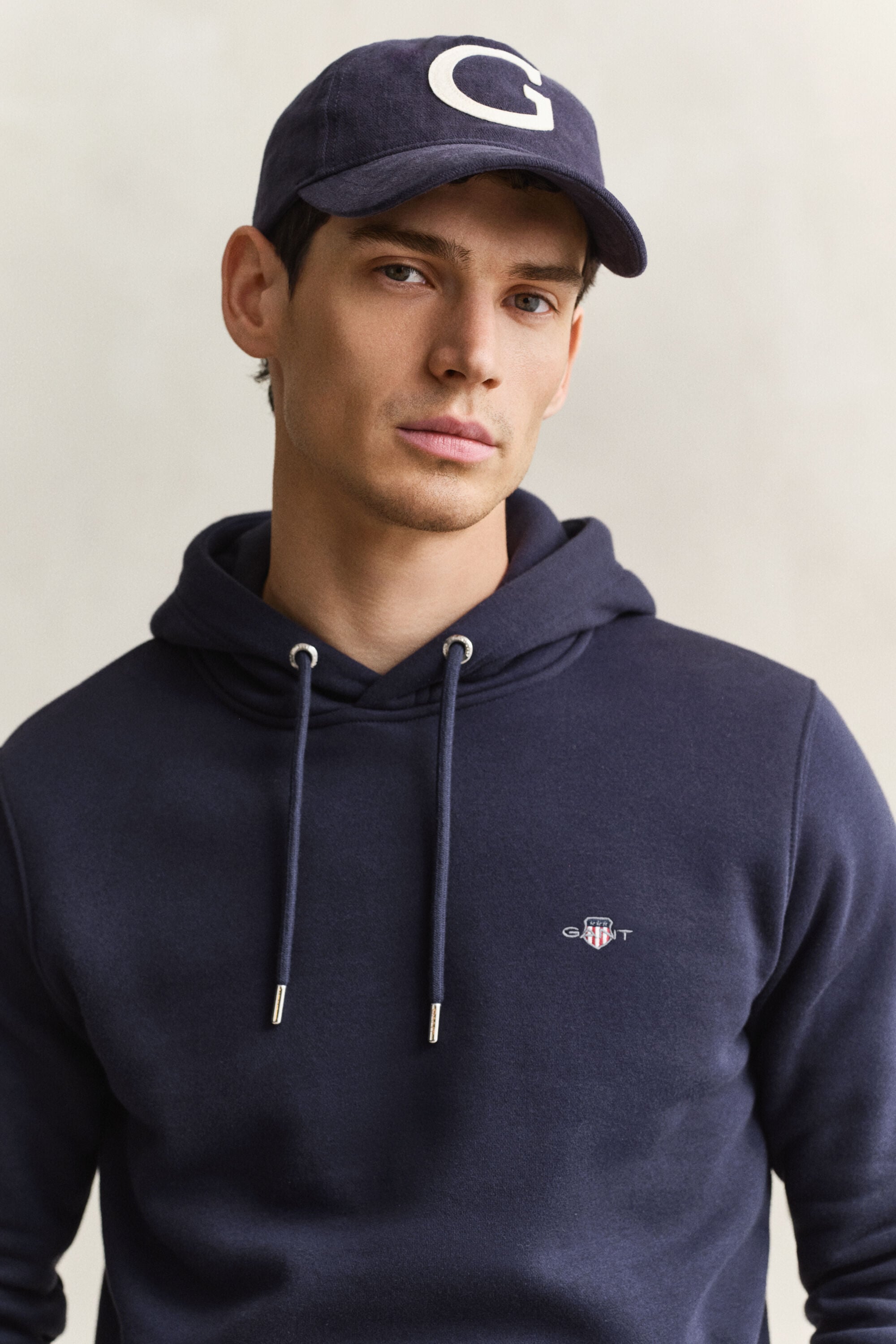 Sweat à capuche avec écusson
