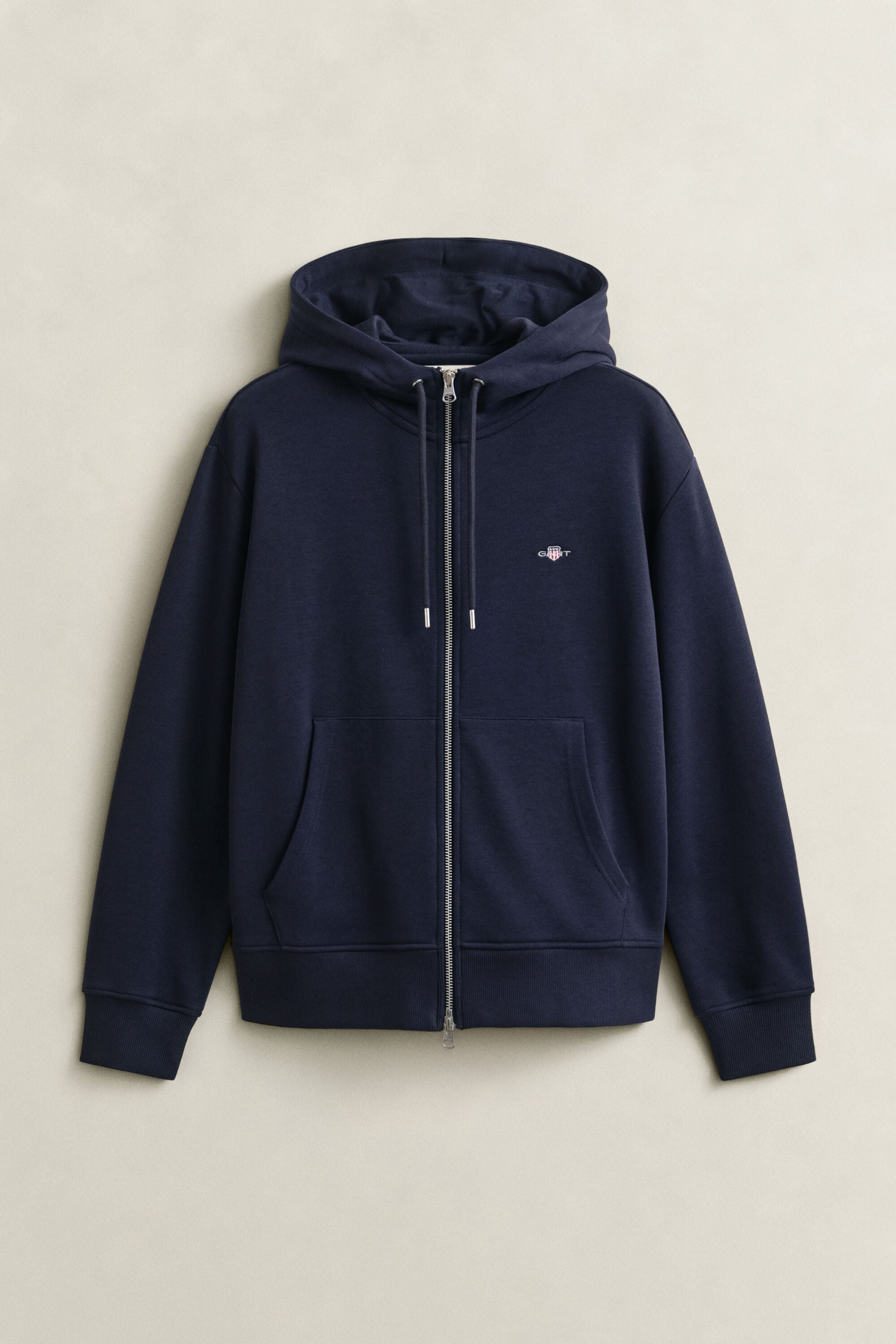 Sweat à capuche zippé avec écusson