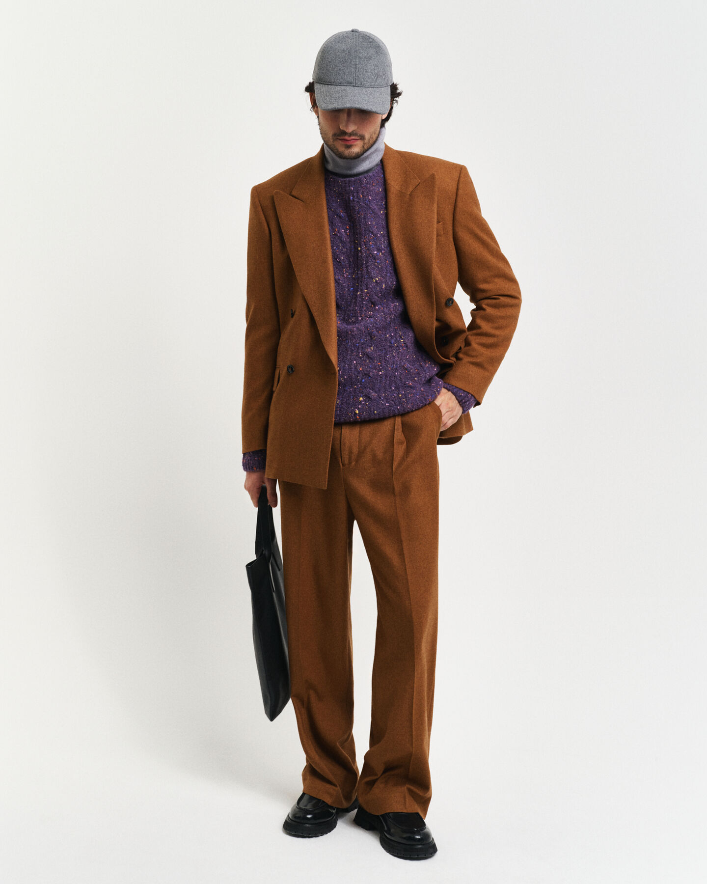 Boucl&eacute;gebreide kabeltrui