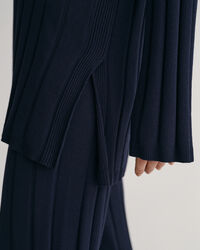 Pull en maille côtelée à col ouvert