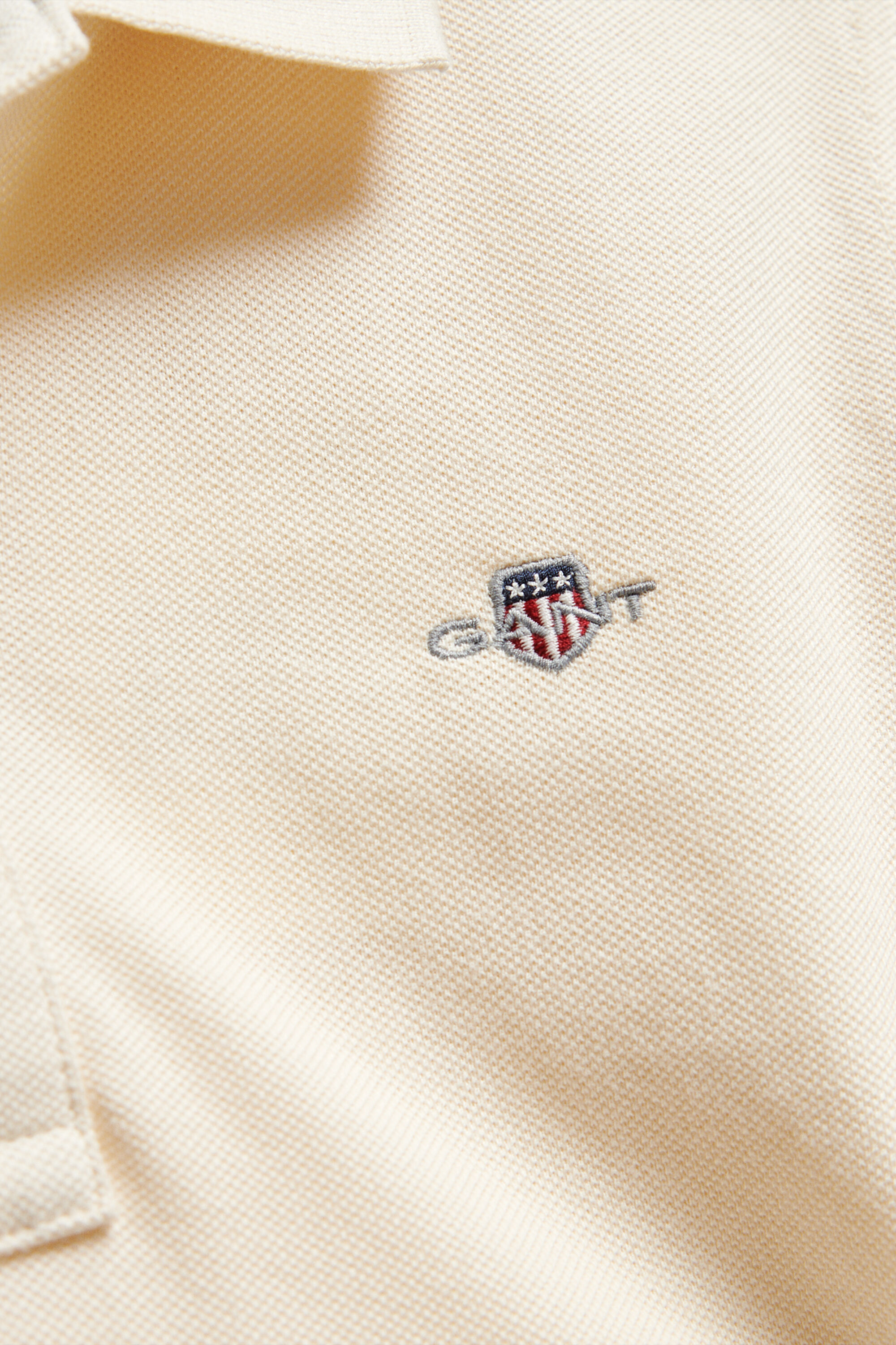 Poloshirt met schild voor tieners
