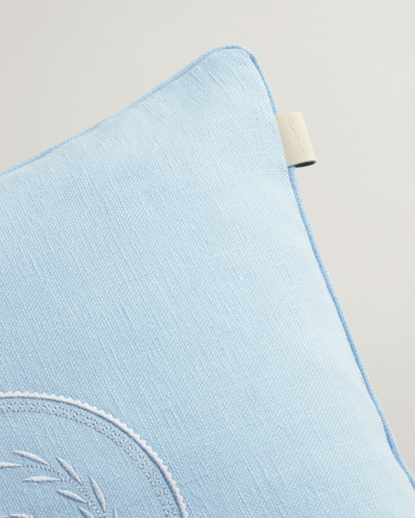 Housse de coussin Crest ton sur ton