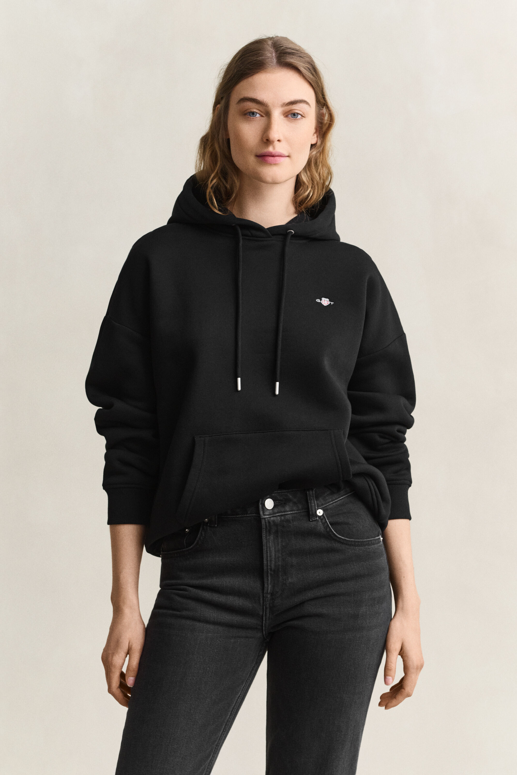 Sweat à capuche avec écusson