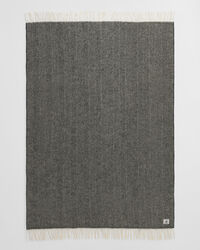 Jeté de lit en laine à chevrons