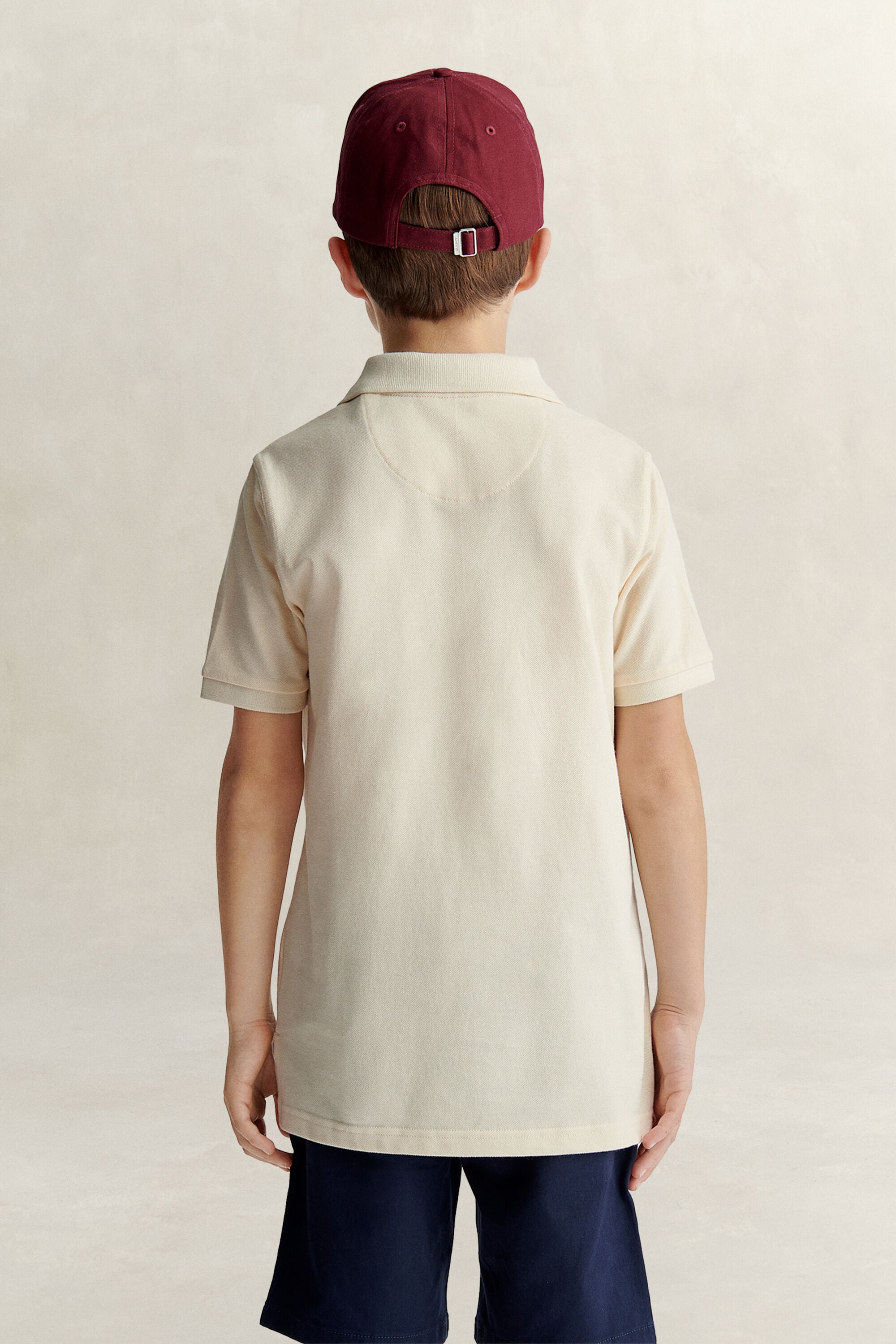 Poloshirt met schild voor tieners