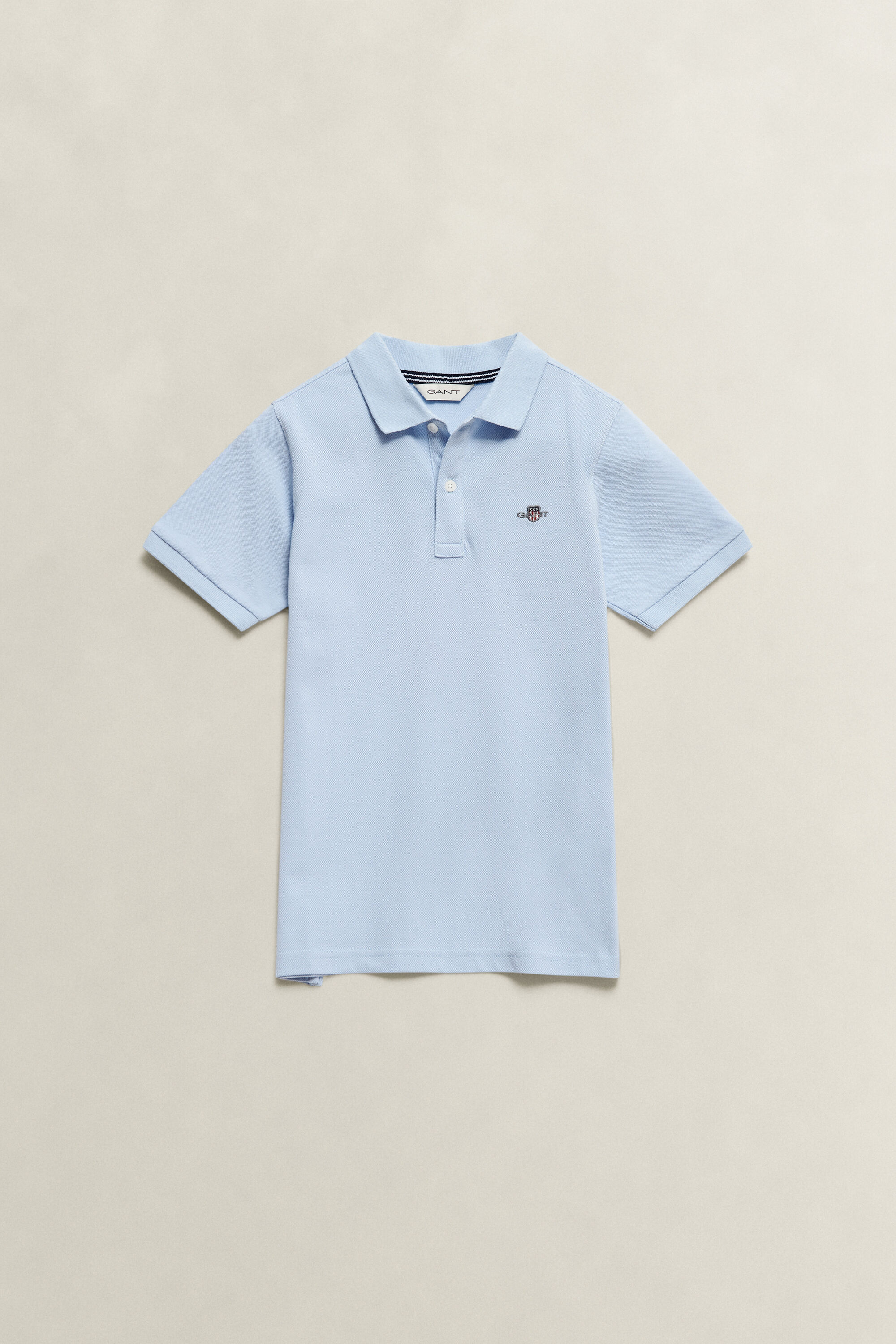 Polo avec écusson Ado