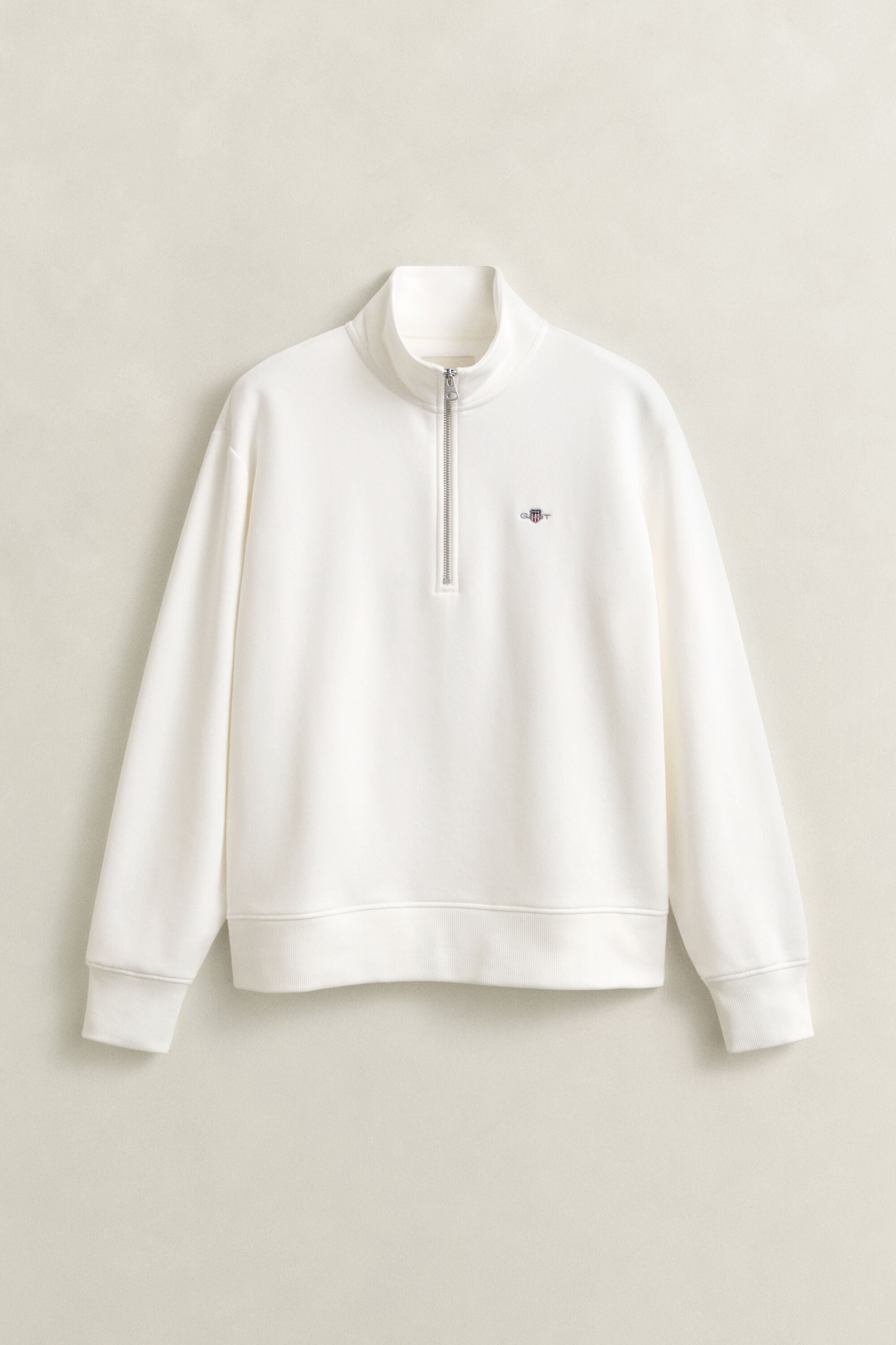 Sweat-shirt à demi-zip avec écusson