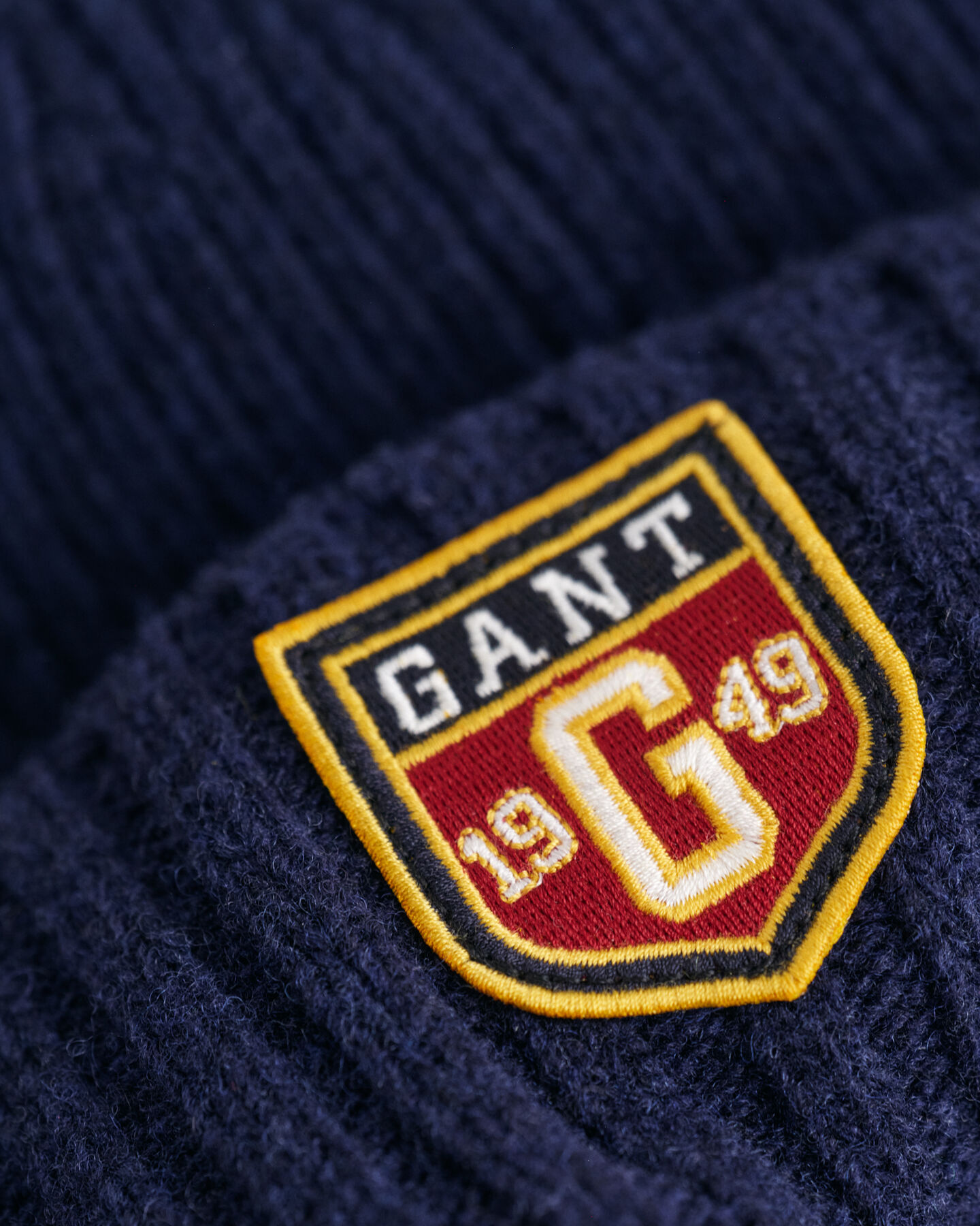 Bonnet en laine avec écusson