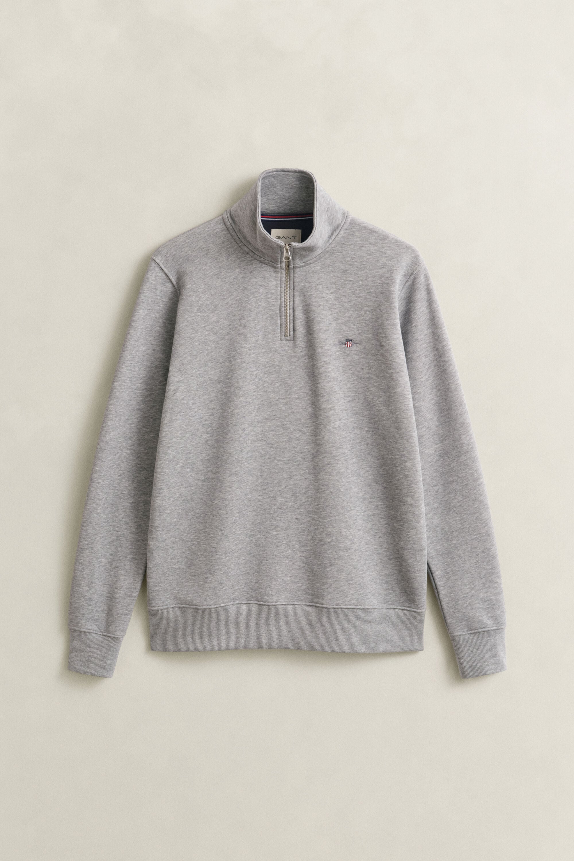 Sweat-shirt à demi-zip avec écusson