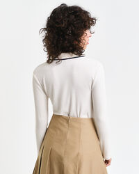 Polo côtelé à manches longues