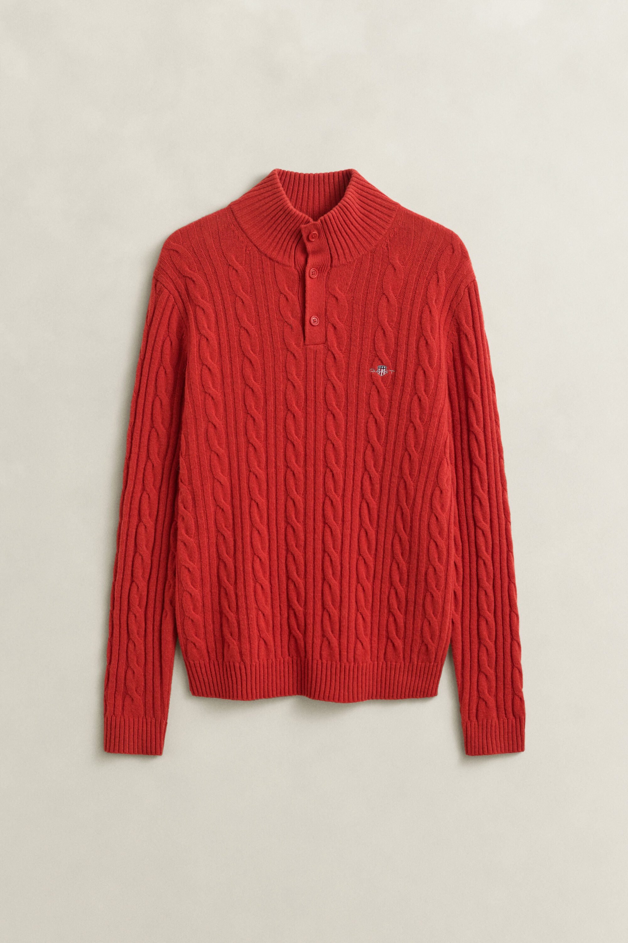 Pull semi-boutonné en laine d’agneau à maille torsadée