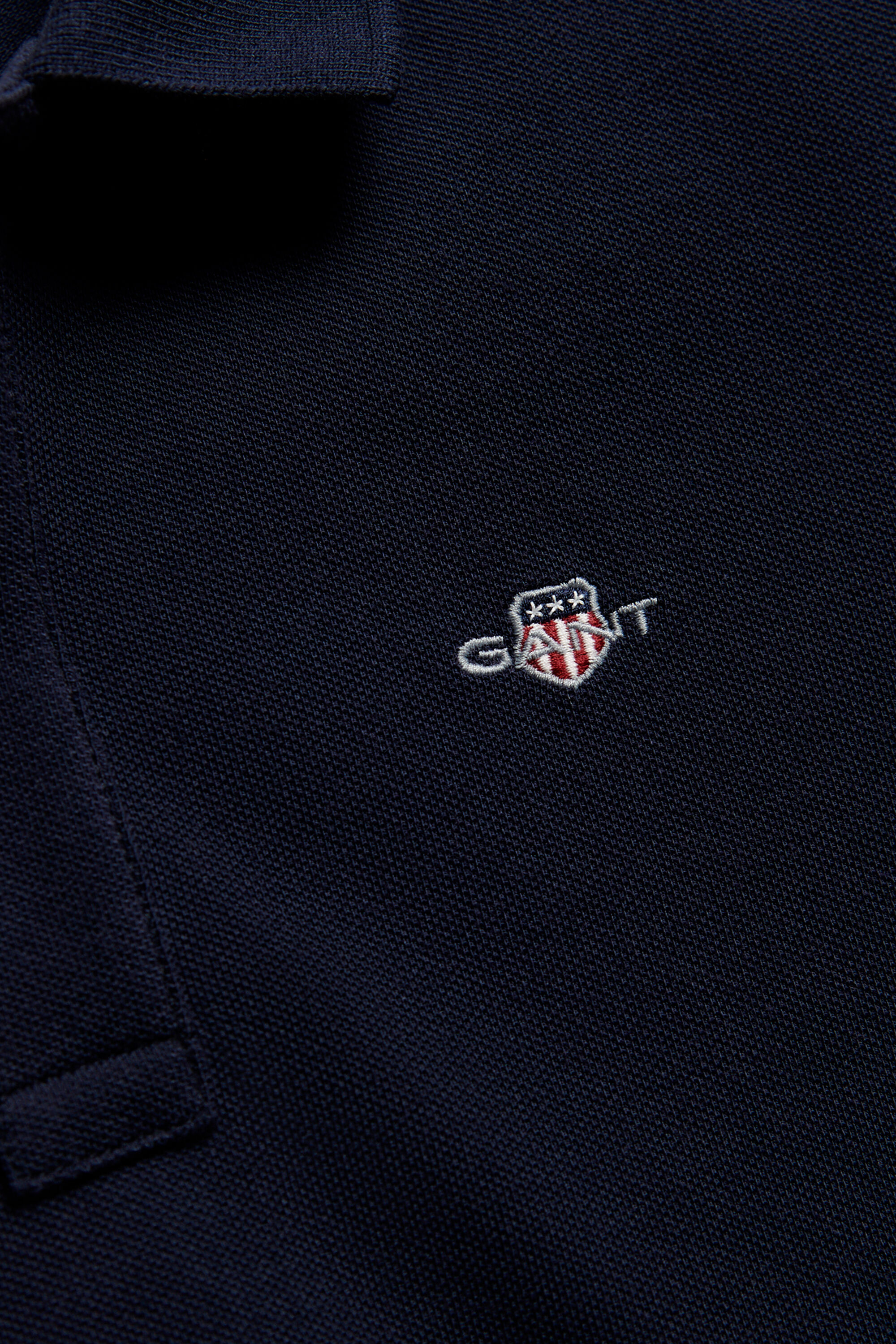 Teens Shield piqué poloshirt