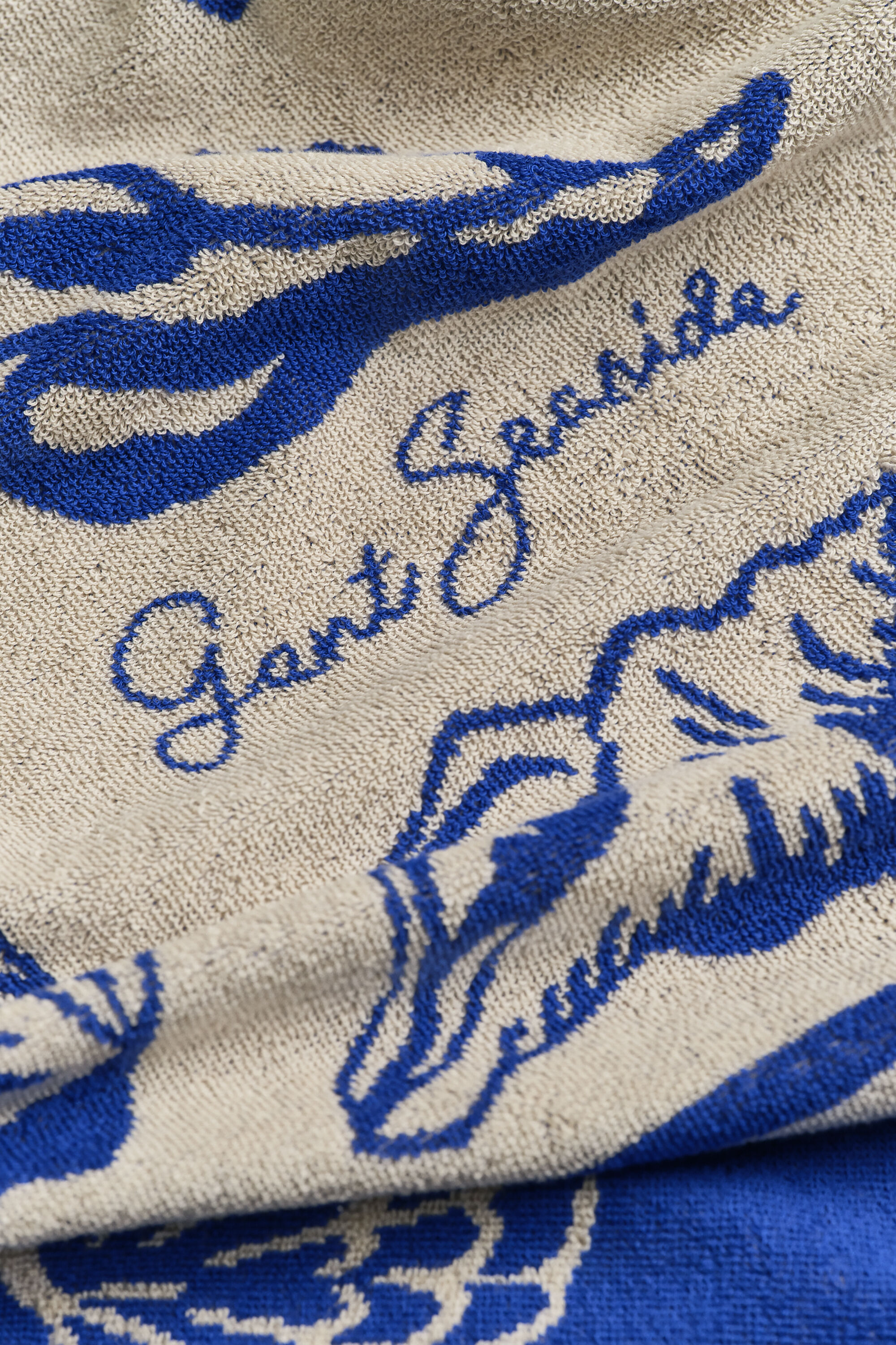 Strandlaken met schelpenprint