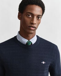 Pull col rond en maille torsadée