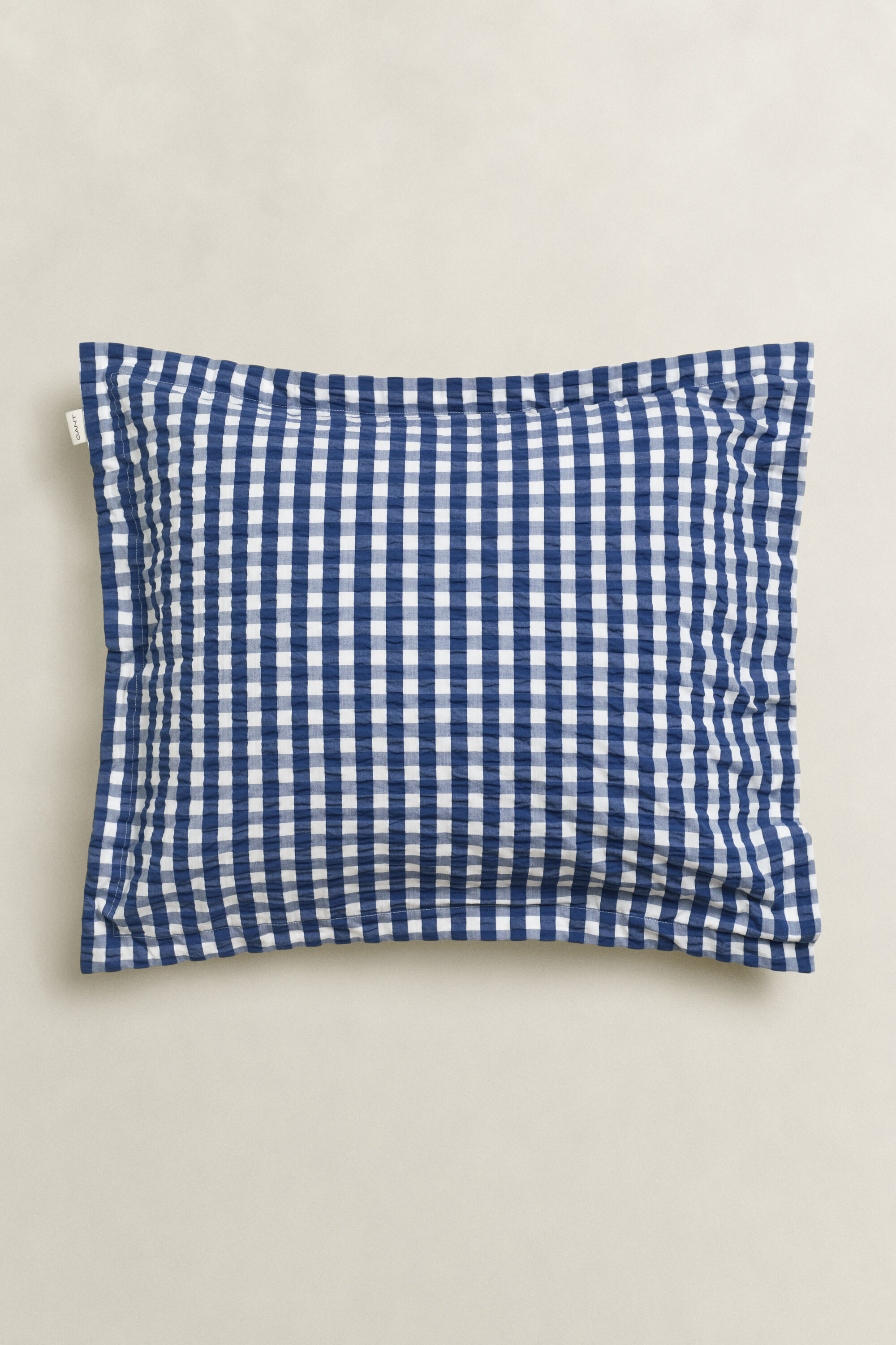 Geruit kussensloop van seersucker