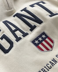 Retro Shield sweater met korte rits