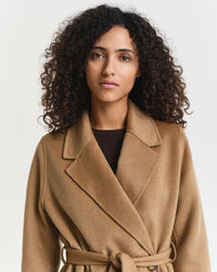 Manteau cousu main avec ceinture