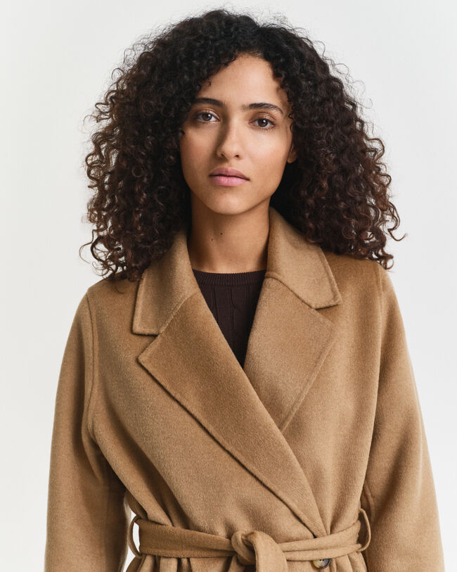 Manteau cousu main avec ceinture