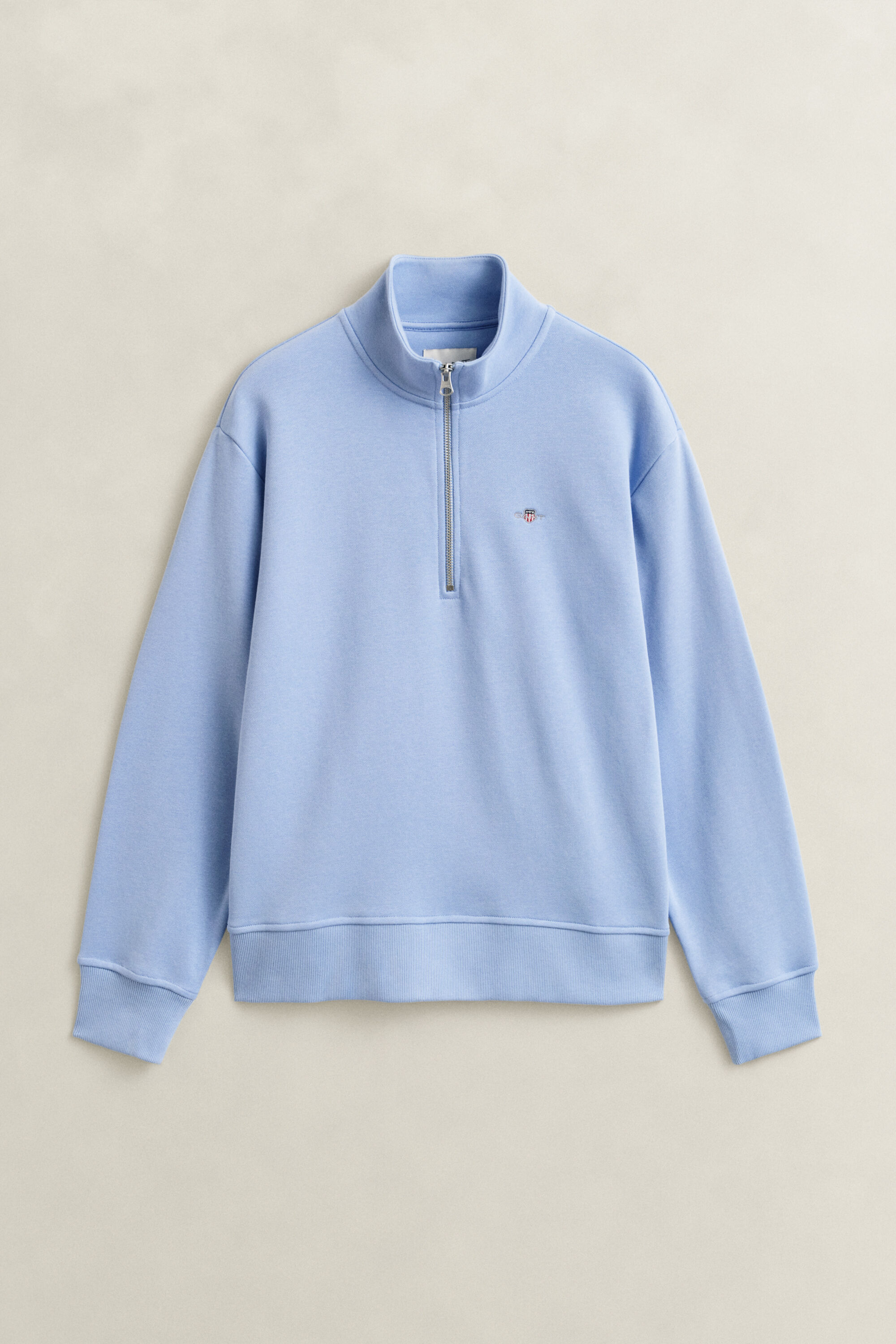Sweat-shirt à demi-zip avec écusson