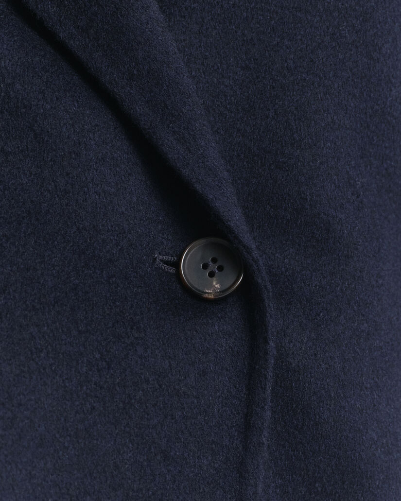 Veste cousue main avec ceinture