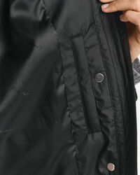 Gewatteerde jas met corduroy details