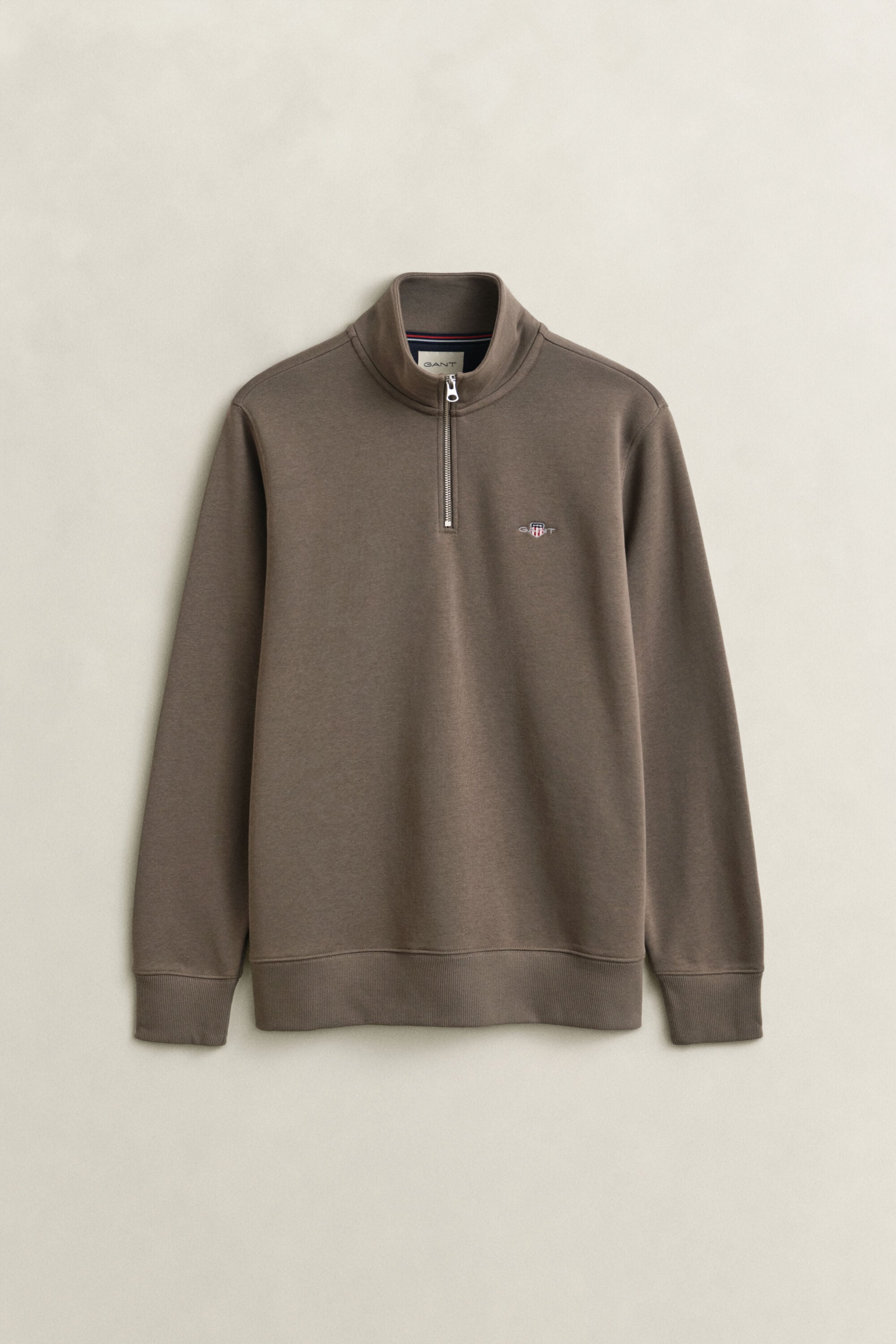 Sweat-shirt à demi-zip avec écusson