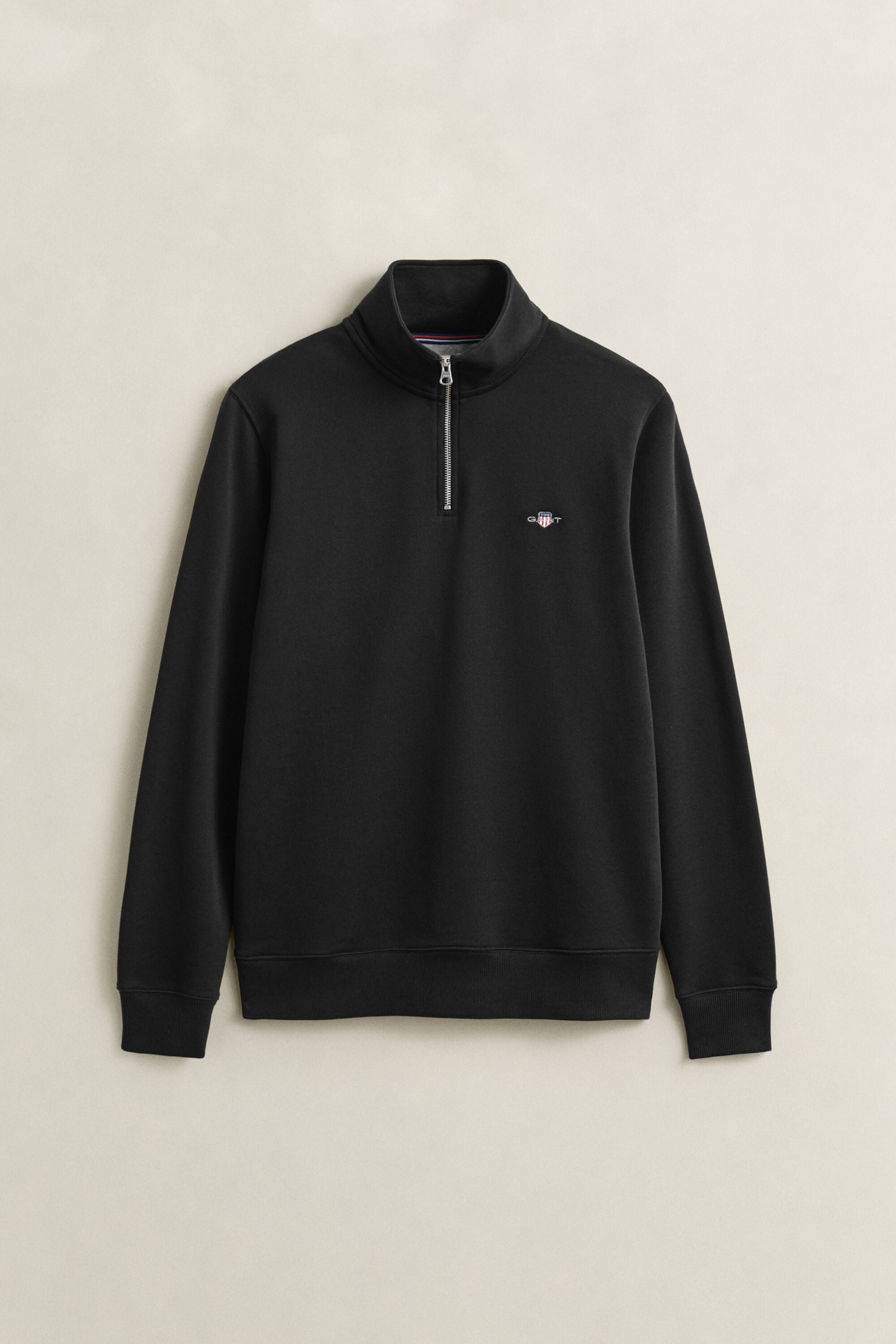 Sweat-shirt à demi-zip avec écusson