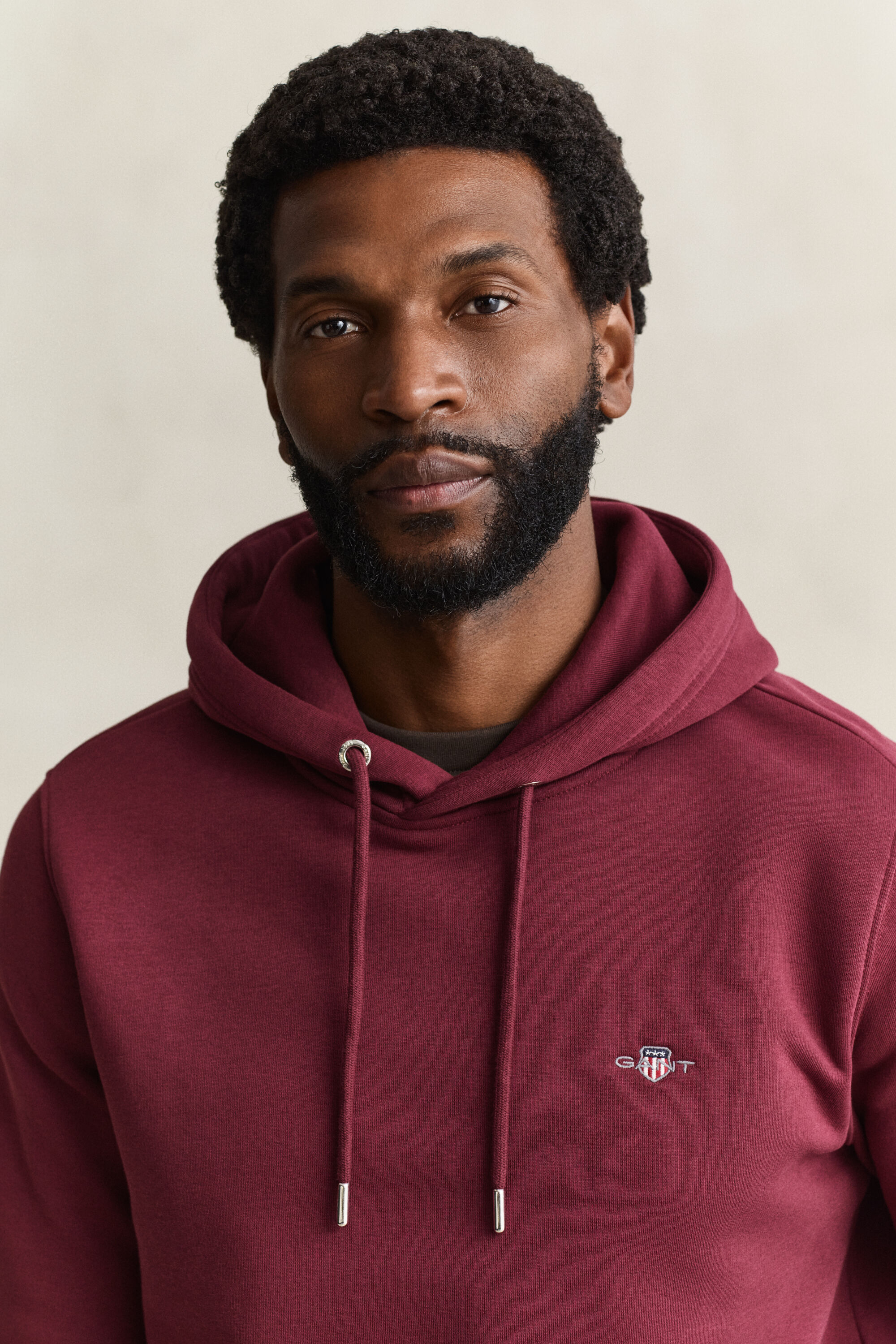 Sweat à capuche avec écusson