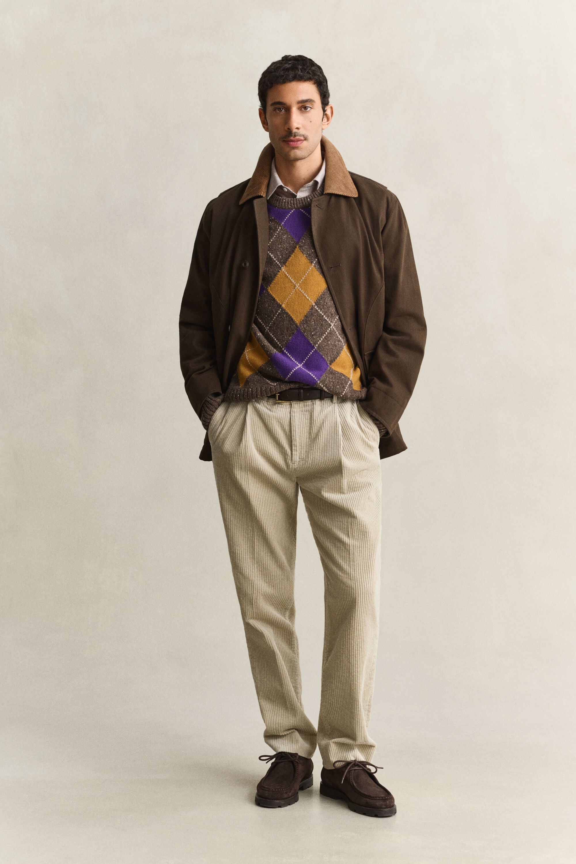 Pull col rond à motif argyle moucheté