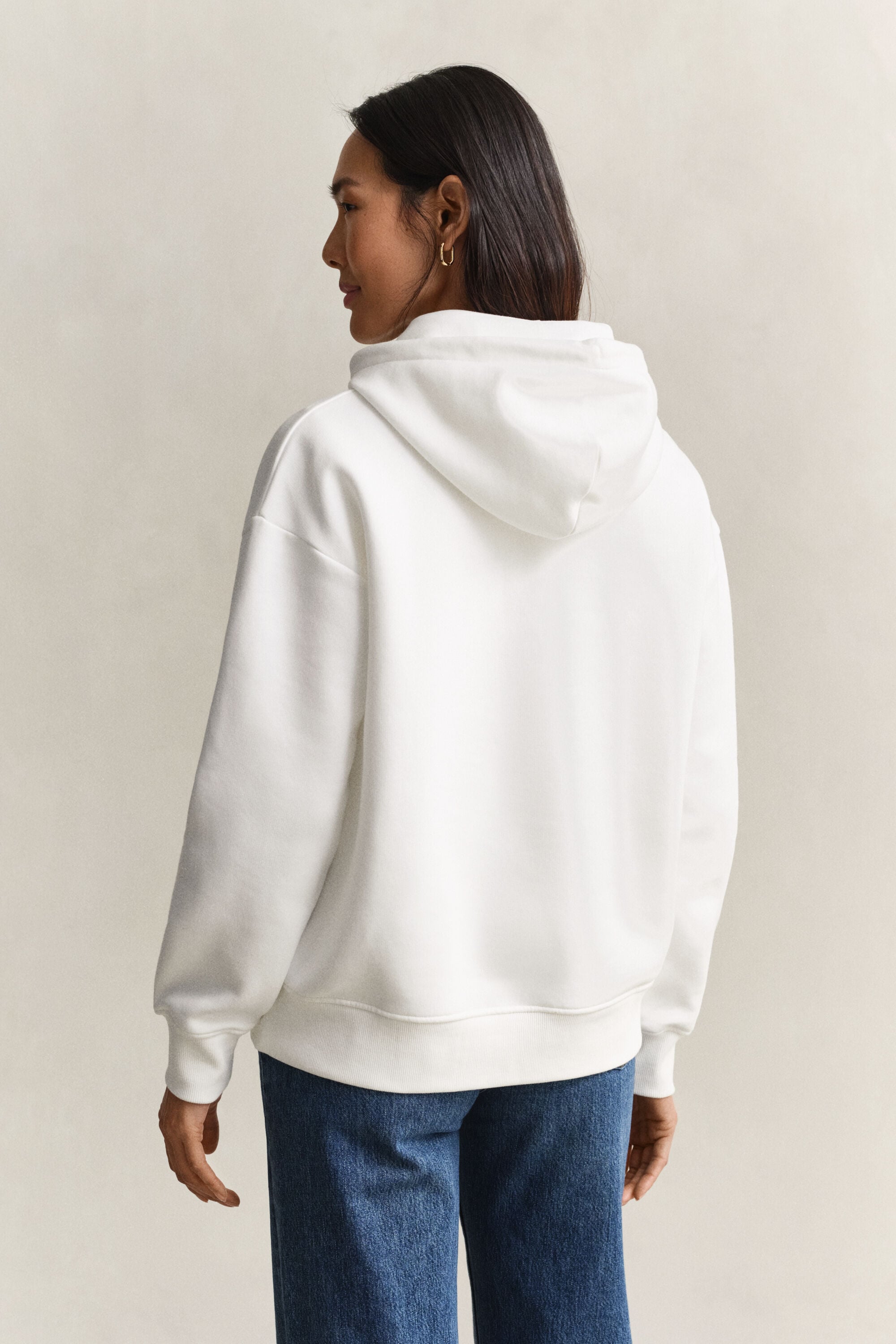 Sweat à capuche avec écusson