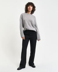 Pantalon habillé coupe slim évasé