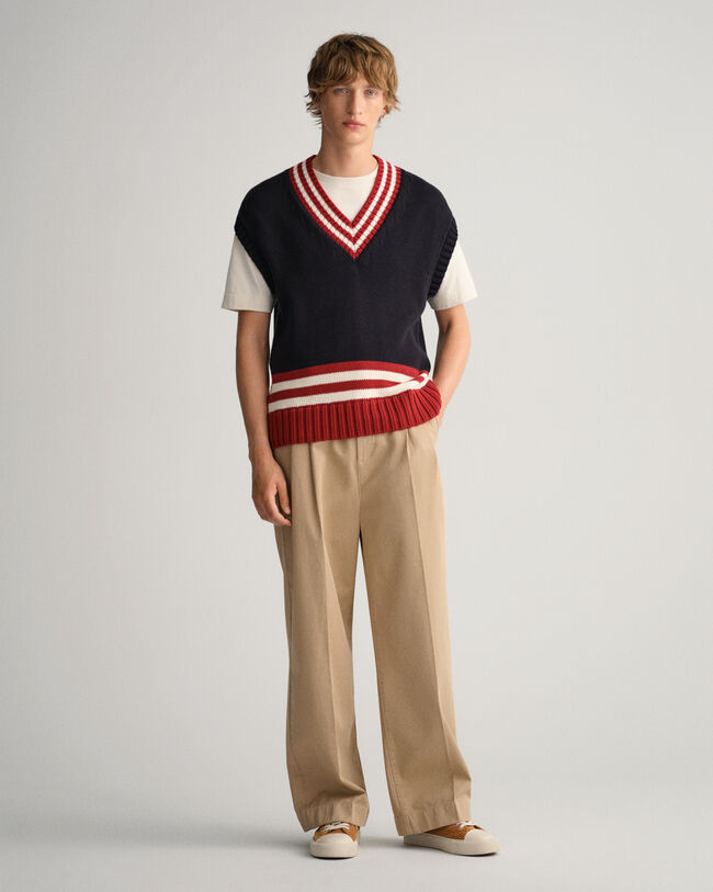 Volume chino met plooien