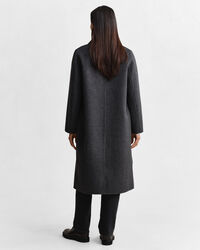 Manteau cousu main à carreaux