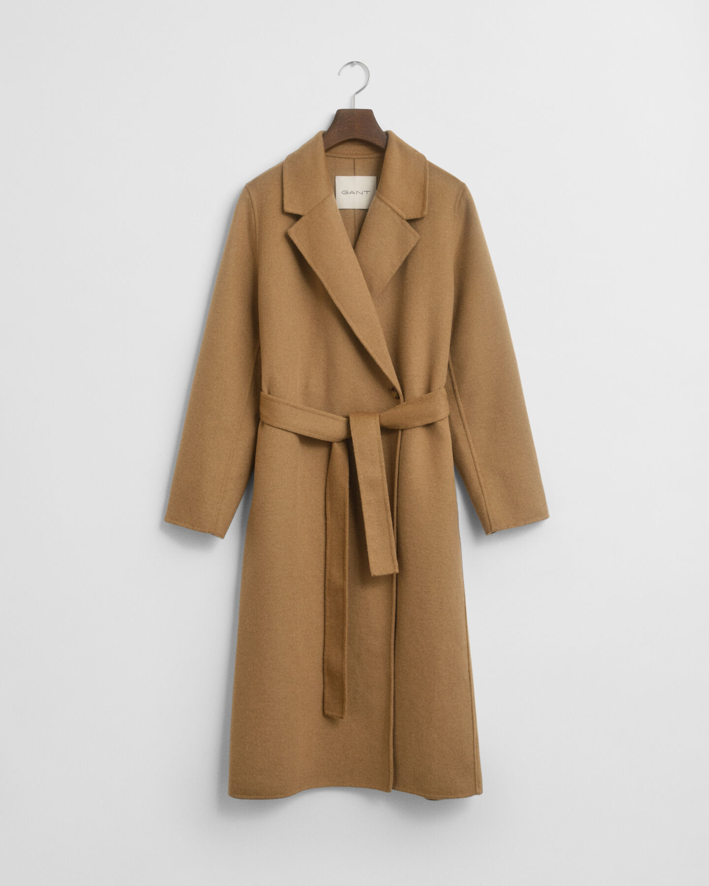 Manteau cousu main avec ceinture