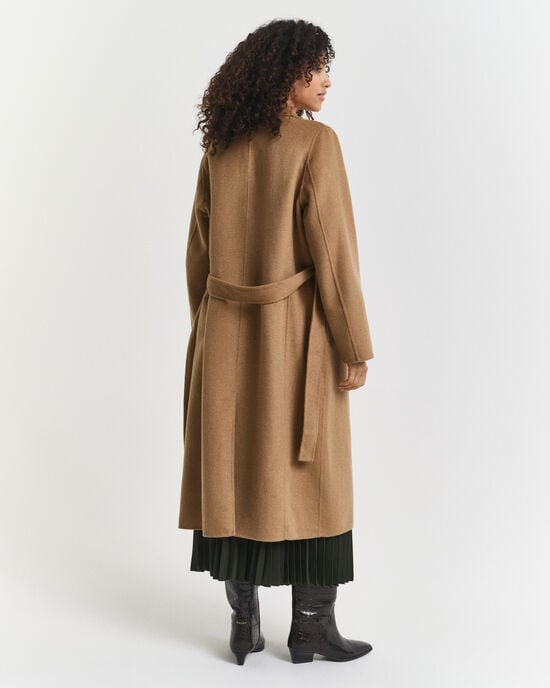 Manteau cousu main avec ceinture