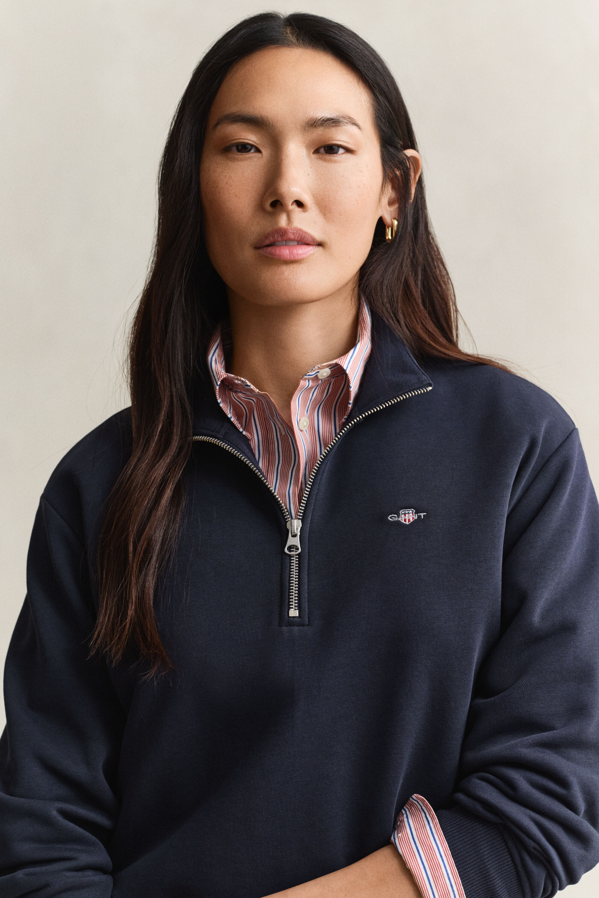 Sweat-shirt à demi-zip avec écusson